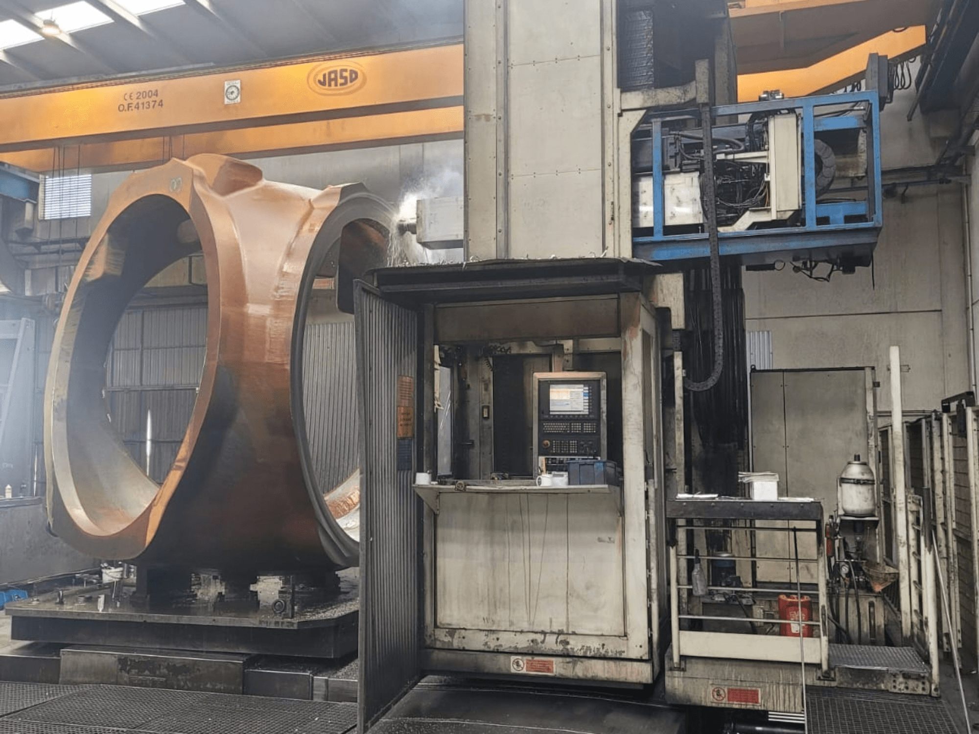 PAMA Speedram 1000 mill-turn centre, side view, showing large workpiece and control panel in industrial setting.