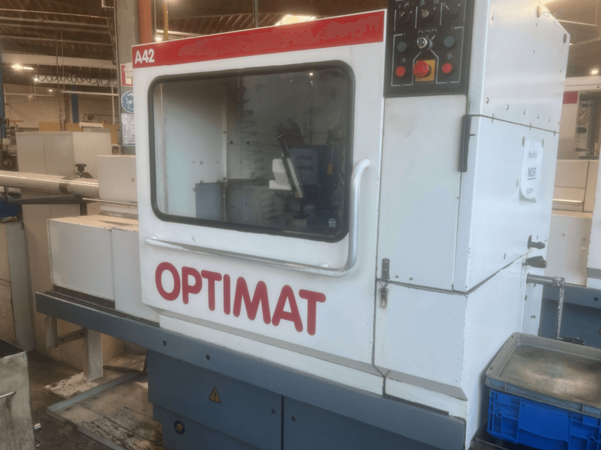 KOVOSVIT MAS Optimat A42 horizontal turning machine, front view, showcasing control panel and window for operation visibility.