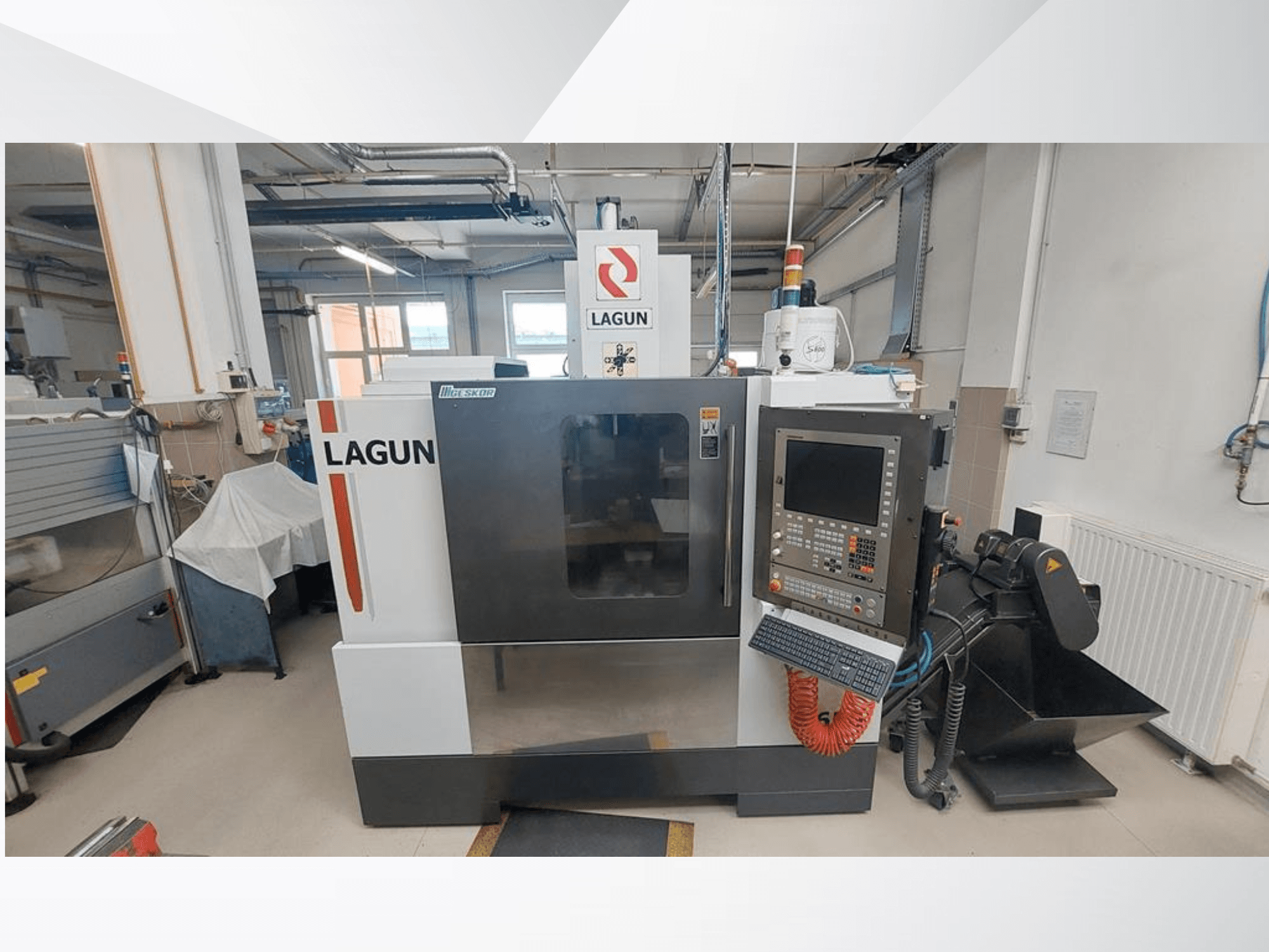 LAGUN L650 vertical machining centre in front view, showcasing control panel, large work area, and dust extraction system.