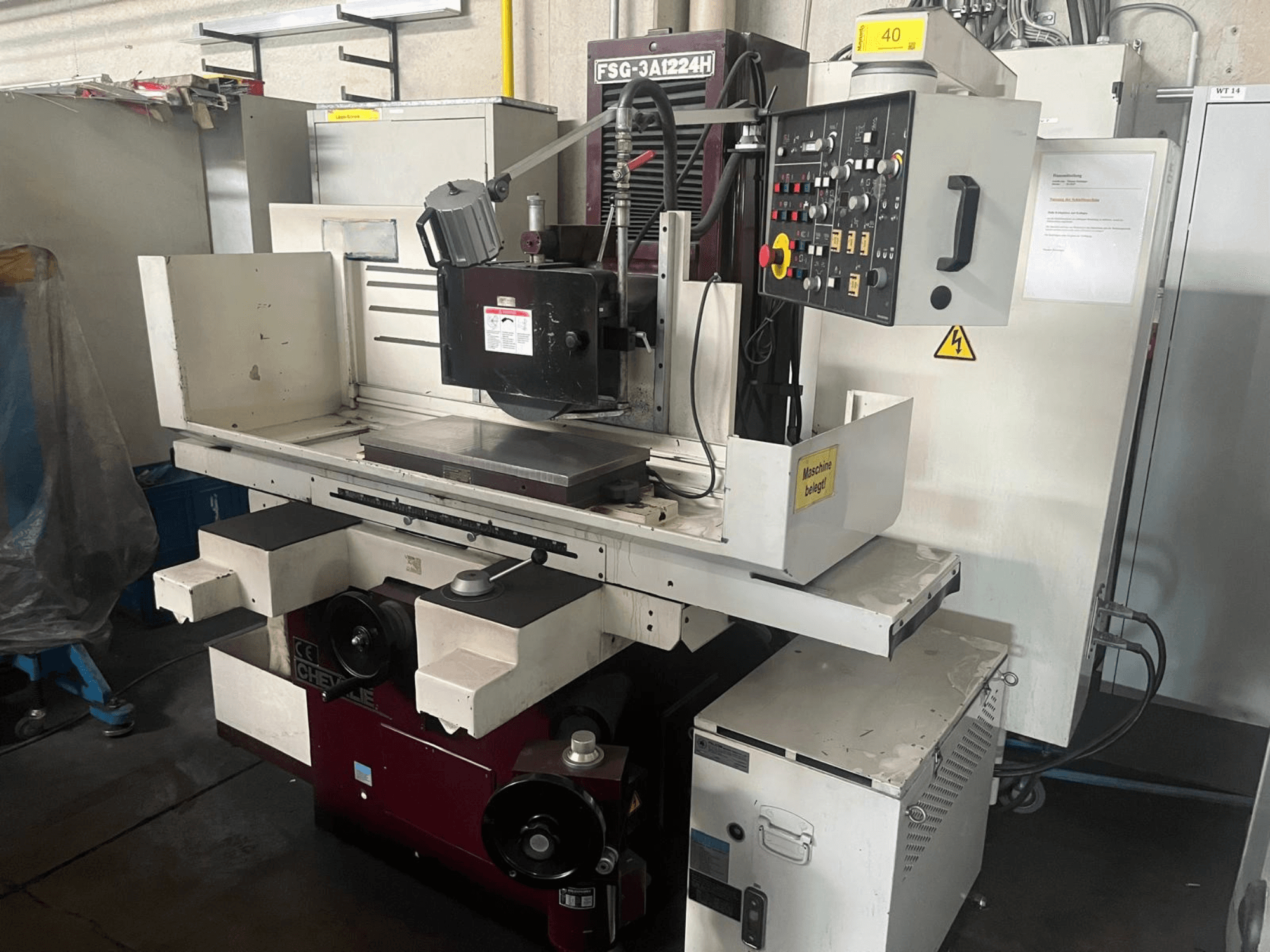 FALCON FSG-3A1224H surface grinding machine, front view, showcasing control panel, grinding wheel, and base components.