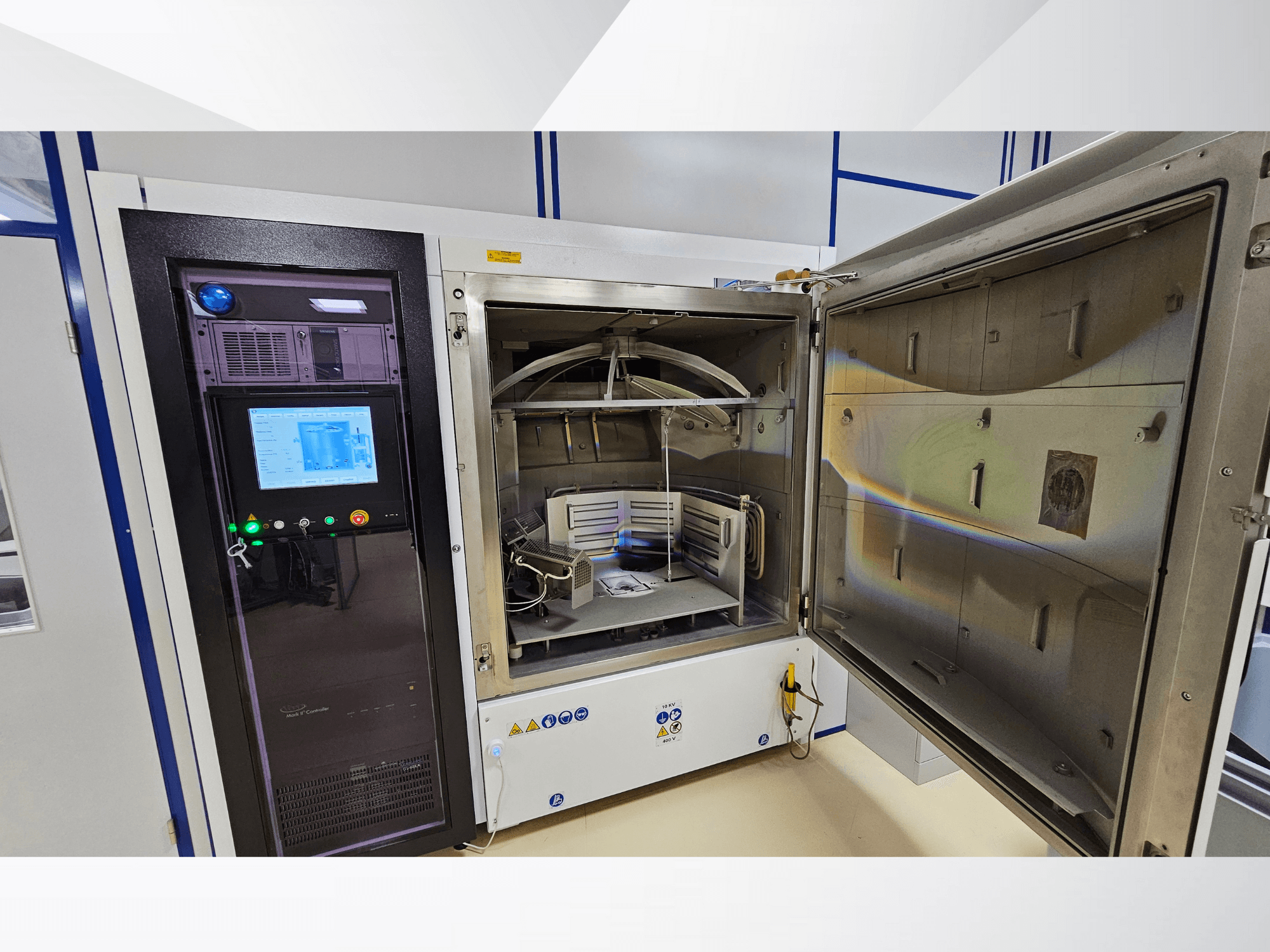 Control panel of a testing chamber by unknown brand, front view; shows touchscreen, indicators, and an open door revealing interior.