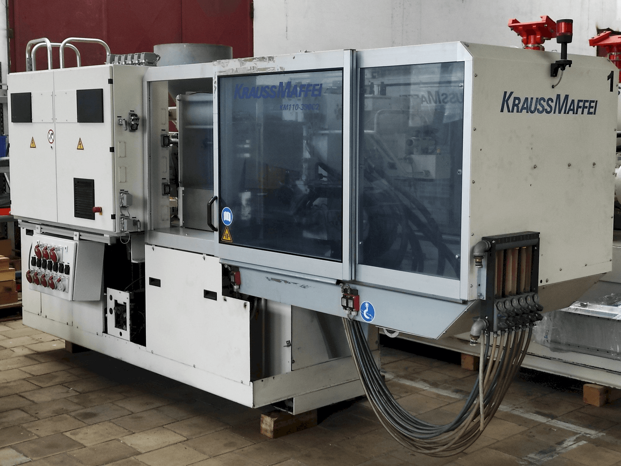 Front view of Krauss Maffei 110 - 390 C2 machine