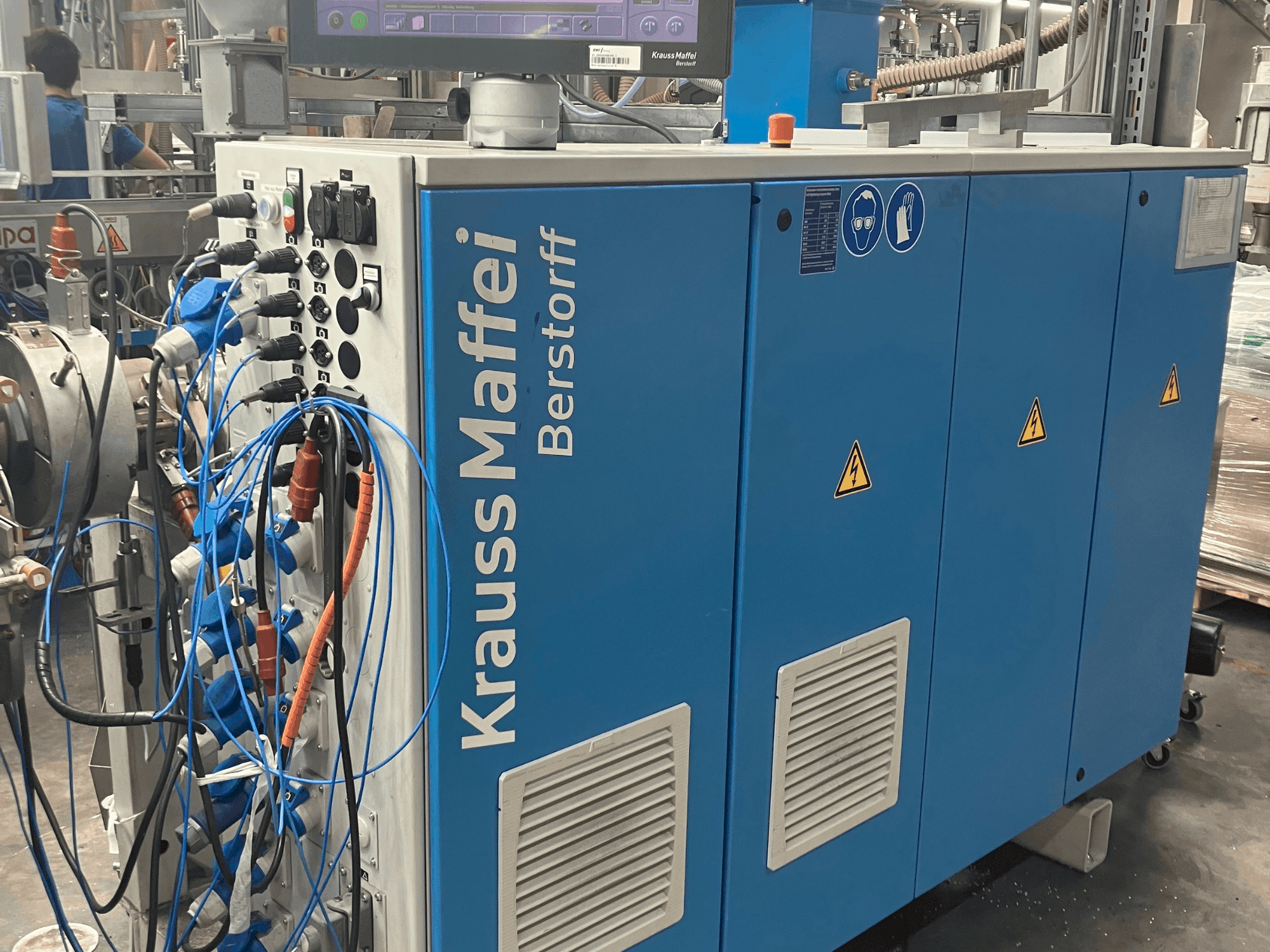 Front view of Krauss Maffei KME 30-25 machine