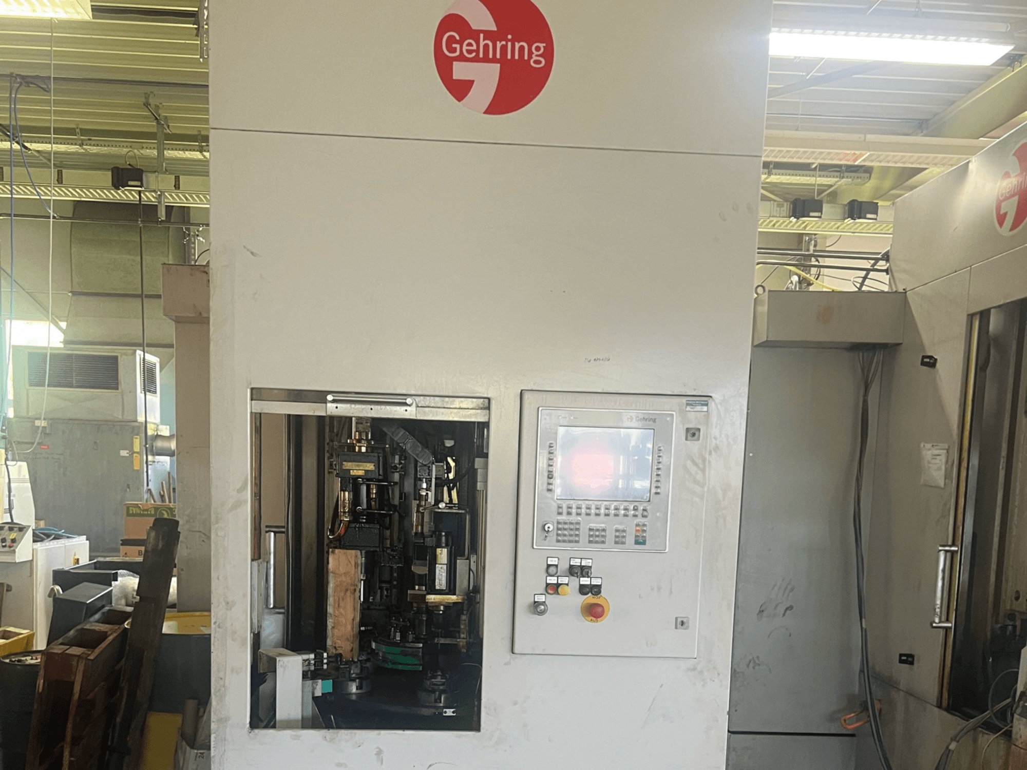 GEHRING L2-630 vertical honing machine, front view, showcasing controls and internal honing mechanics.