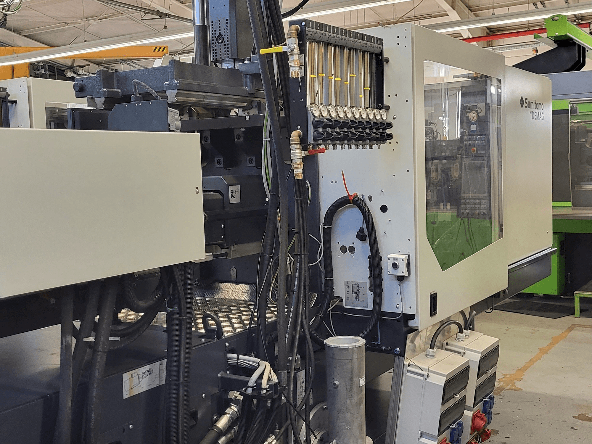 Left side view of Sumitomo SHI DEMAG Systec Multi 120/470-200h/80V machine