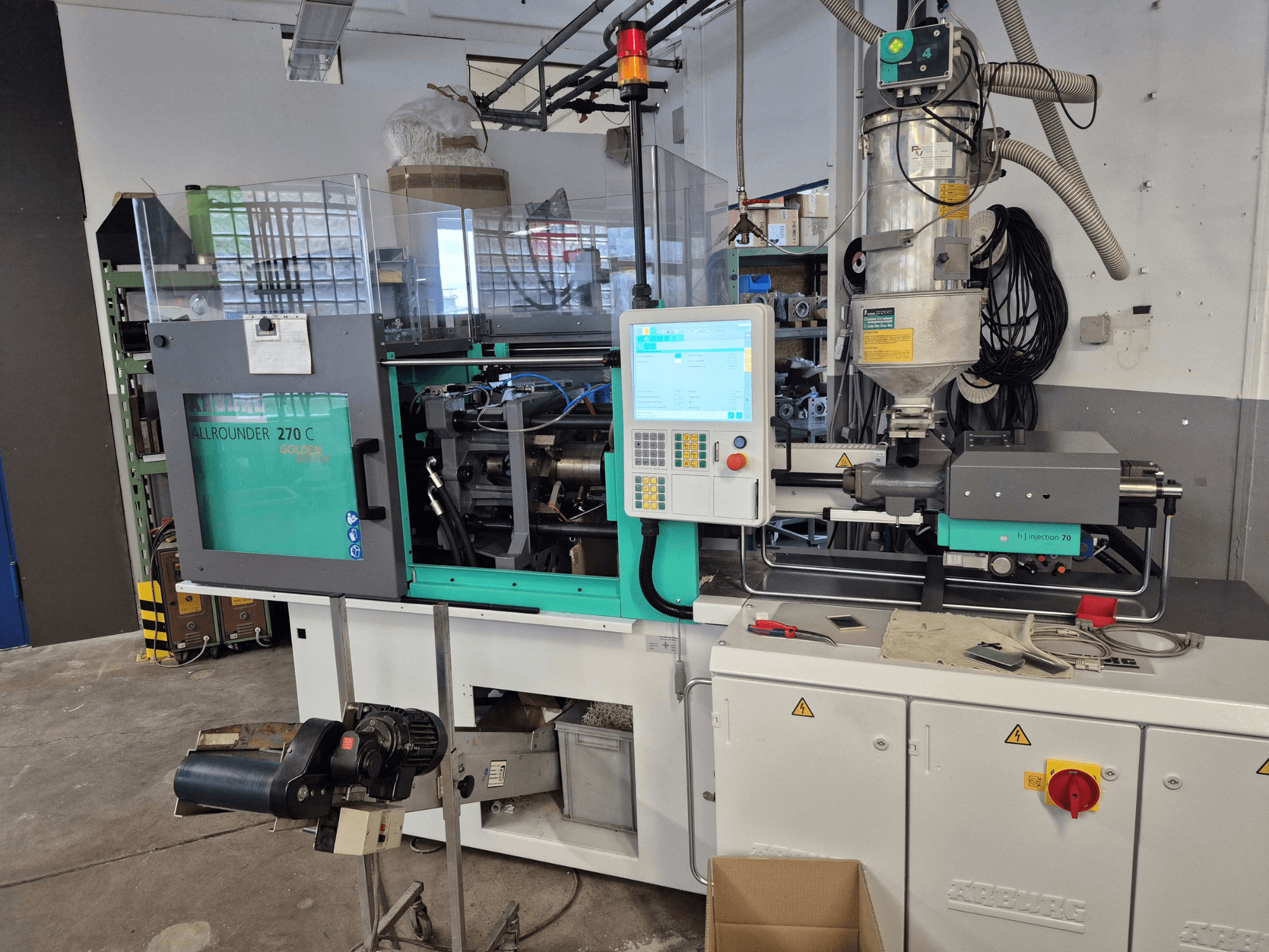 Hydraulic injection moulding machine Arburg Allrounder 270 C 400-70, front view with control panel and material hopper visible.