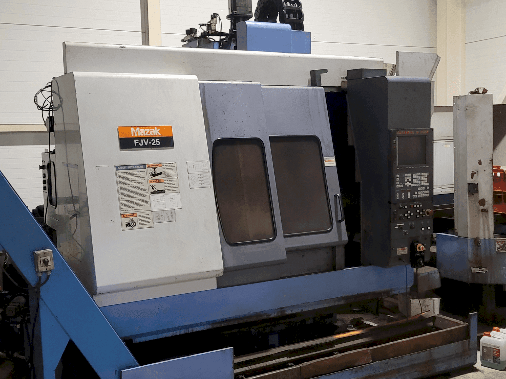 Front view of Mazak FJV-25 machine