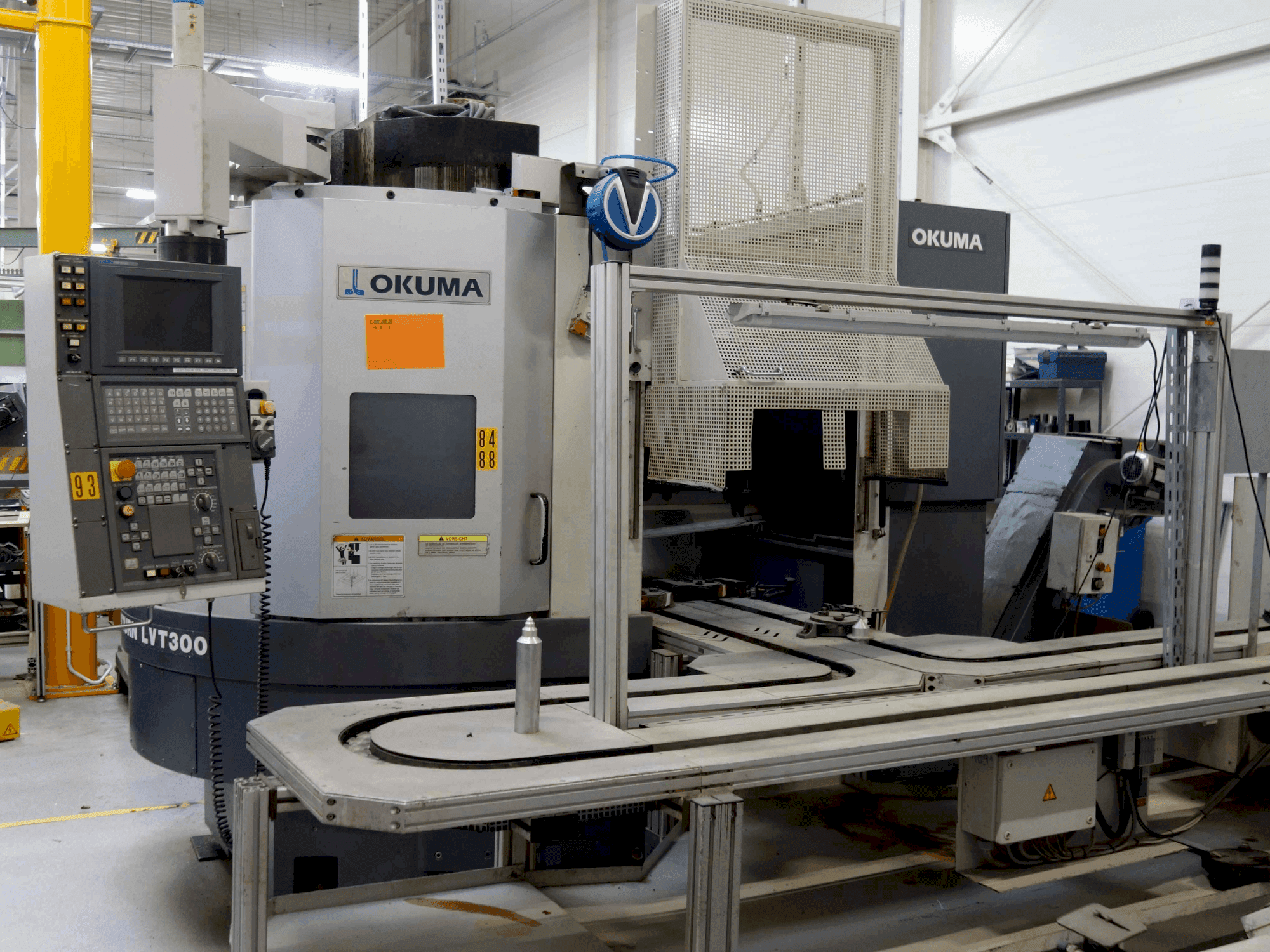 Front view of Okuma LVT 300 machine