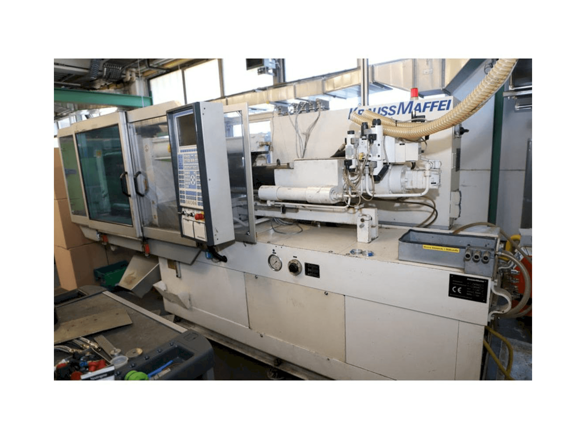 Right side view of Krauss Maffei 65-220 C1 machine