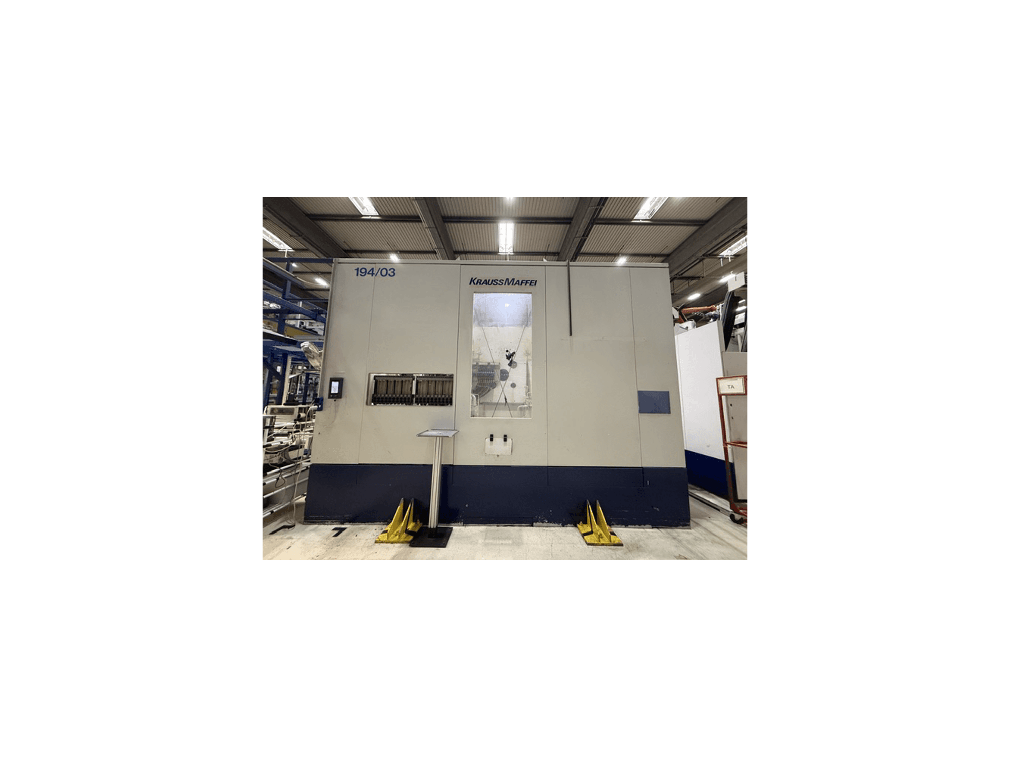 Krauss Maffei 4000-24500 MC hydraulic injection moulding machine, front view showing control panel and operating area.