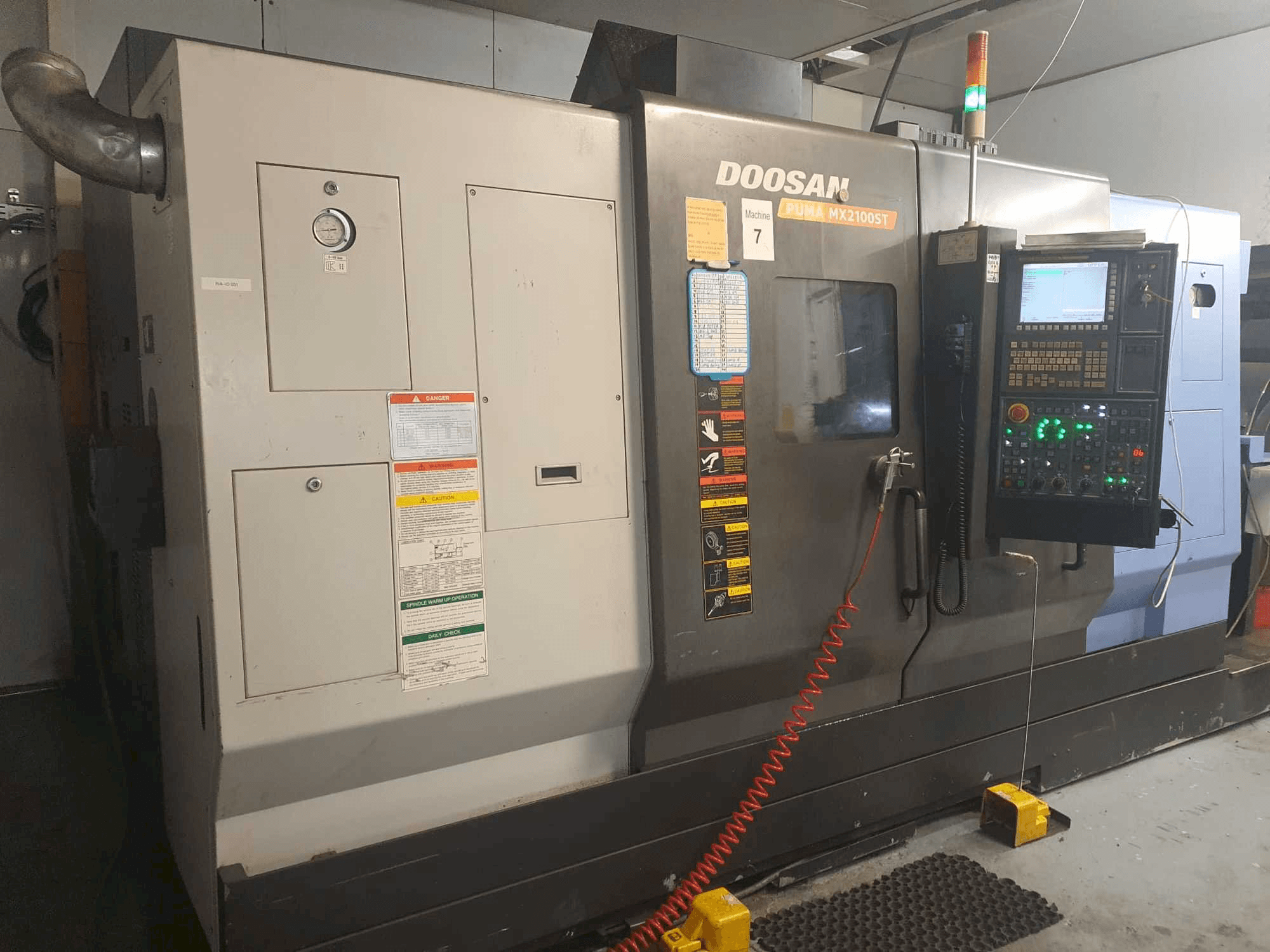 Front view of Doosan Puma MX2100ST machine