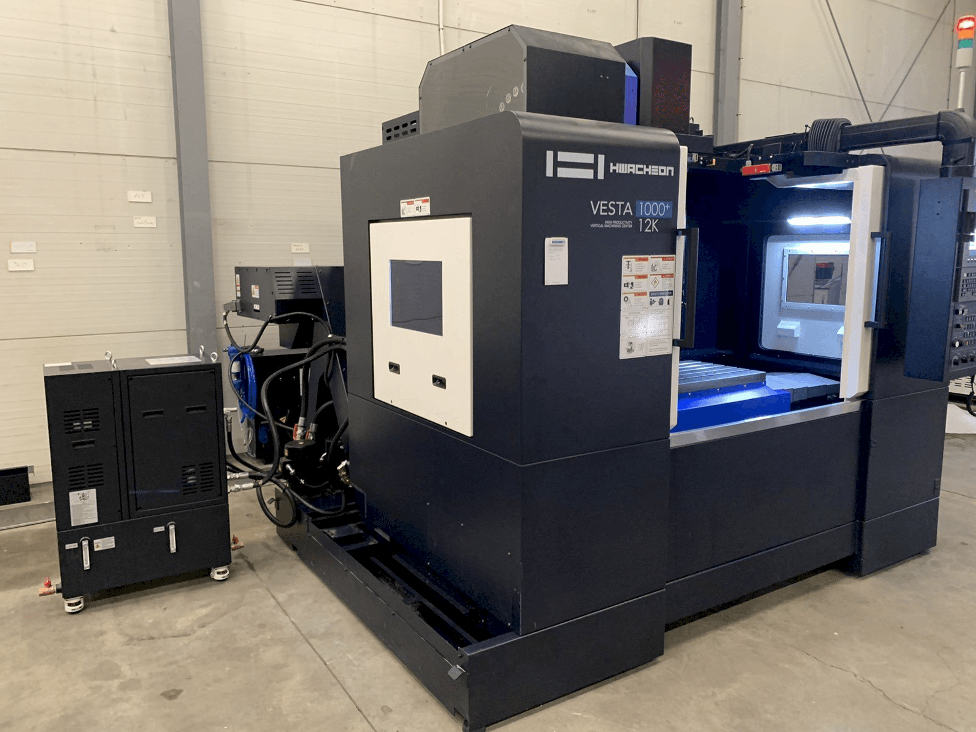 Front view of HWACHEON VESTA-1000+ machine