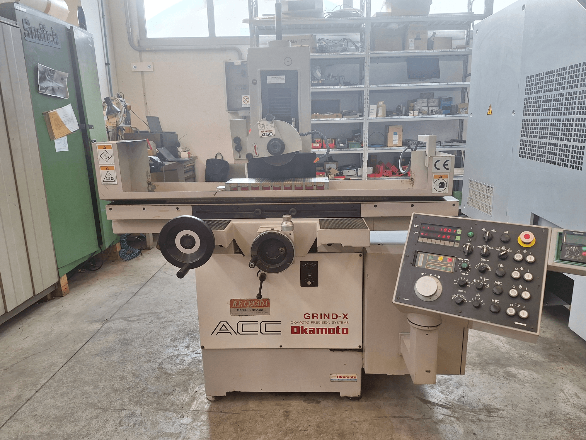 Okamoto ACC Grind-X surface grinder, front view, featuring a control panel with dials and buttons, suitable for precision grinding.