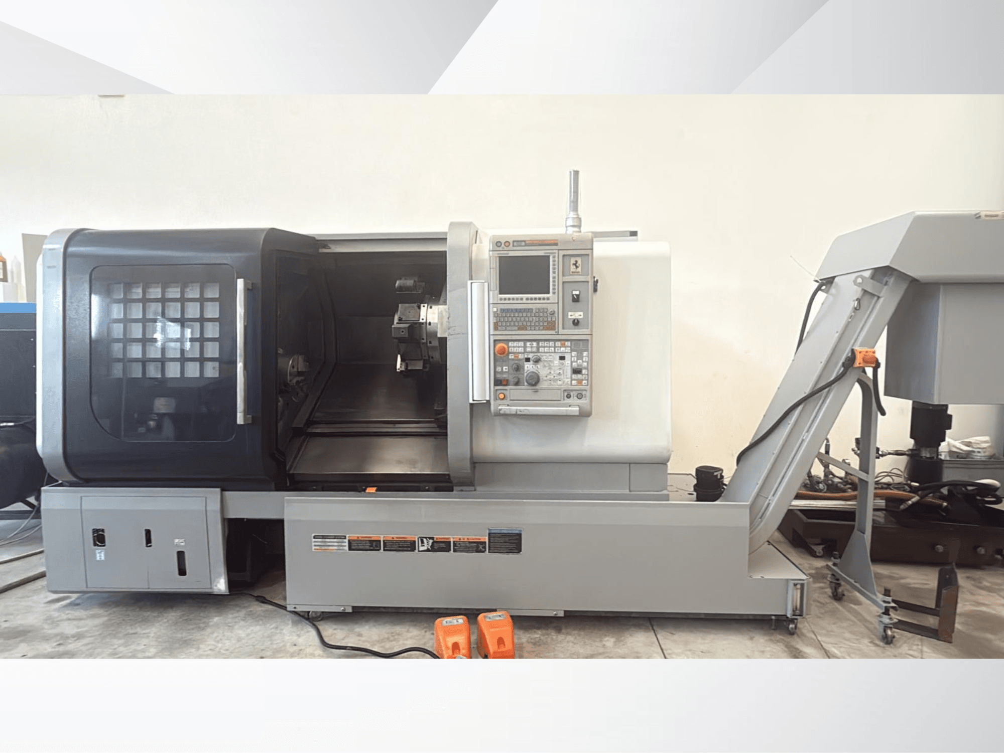 Horizontal turning machine MORI SEIKI NLX 2500M in front view, showcasing control panel and open access for machining.