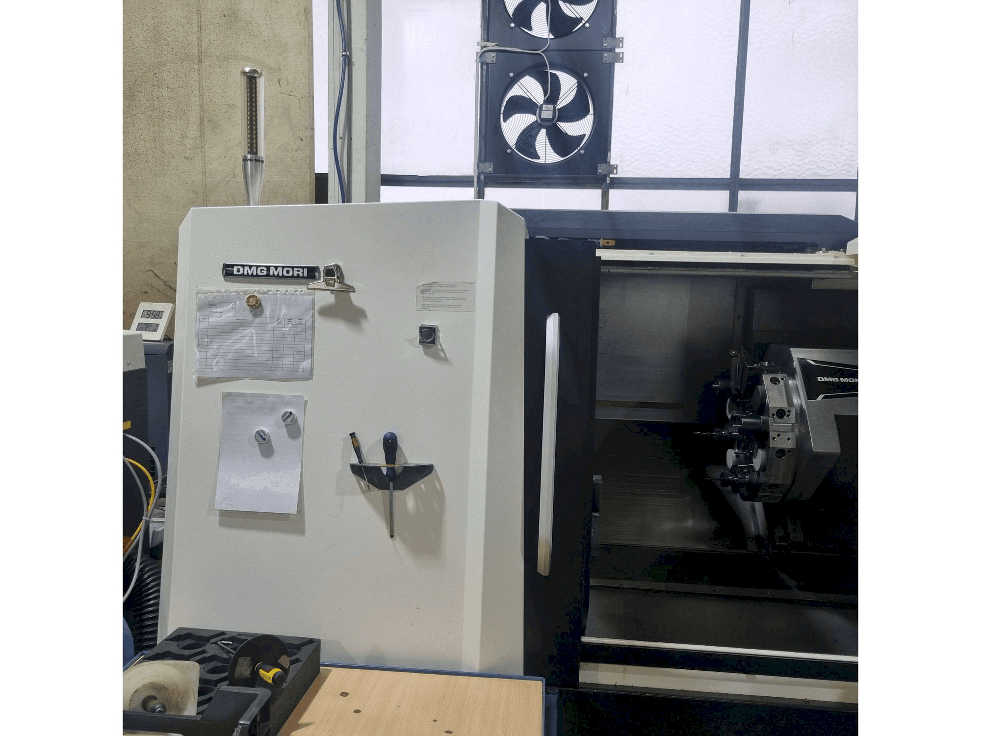 Front view of DMG MORI CLX 450 V4 machine