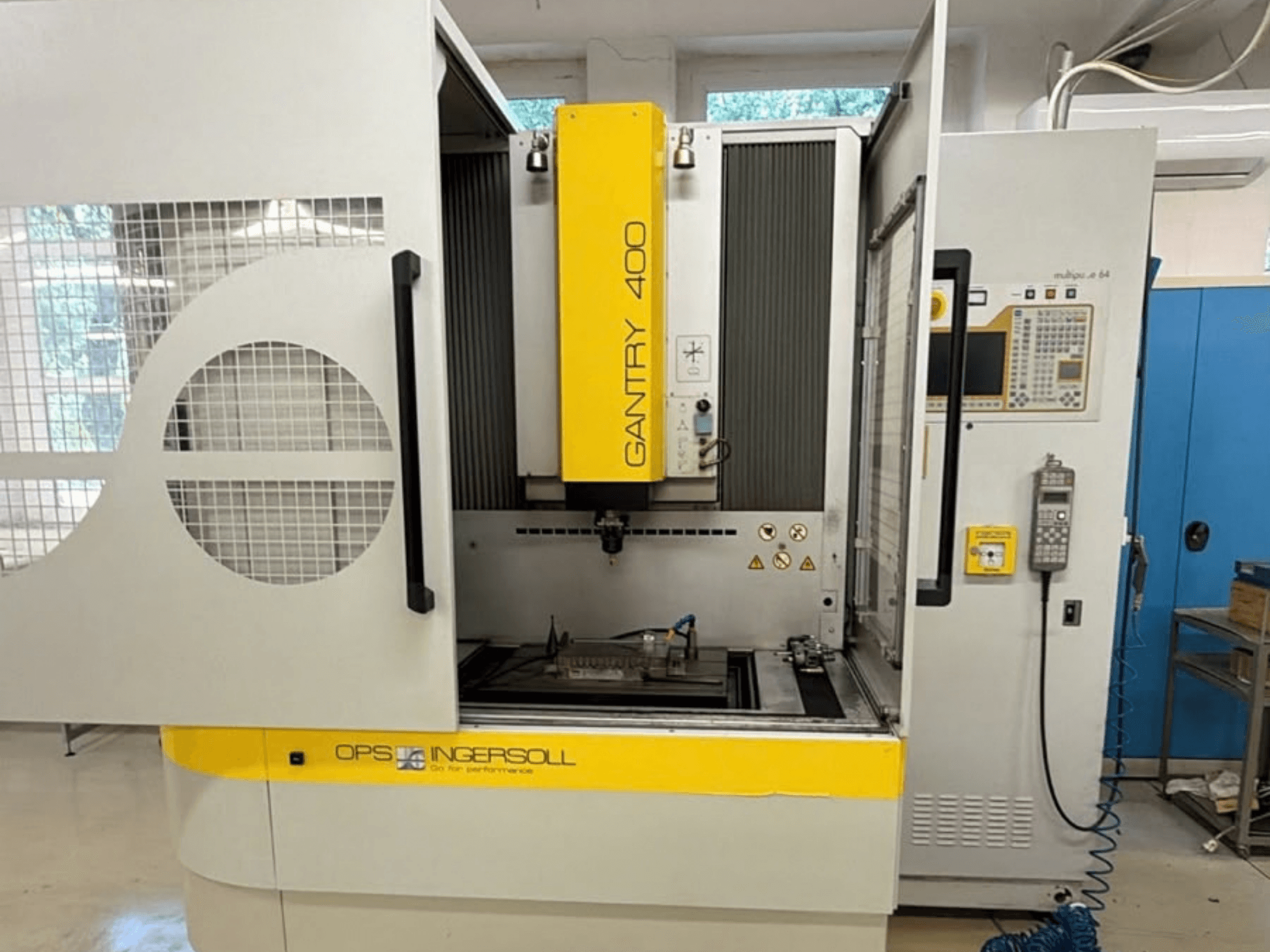 Front view of INGERSOLL Gantry 400 Die-Sinking EDM Machine, showing open doors and control panel, with workpiece positioned inside.