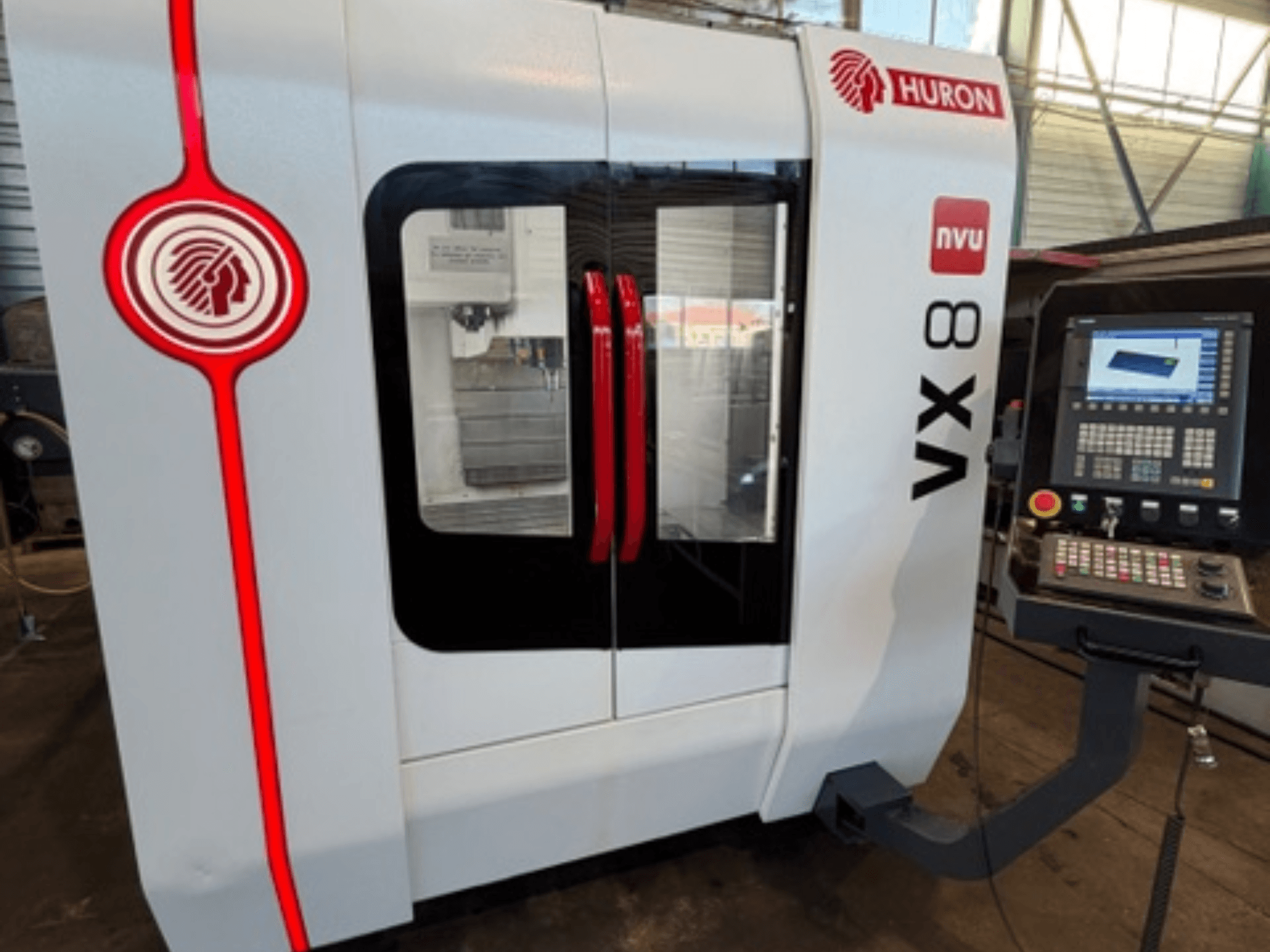 Huron VX 8 NVU milling machine in white and red, front view, featuring control panel with buttons and display.