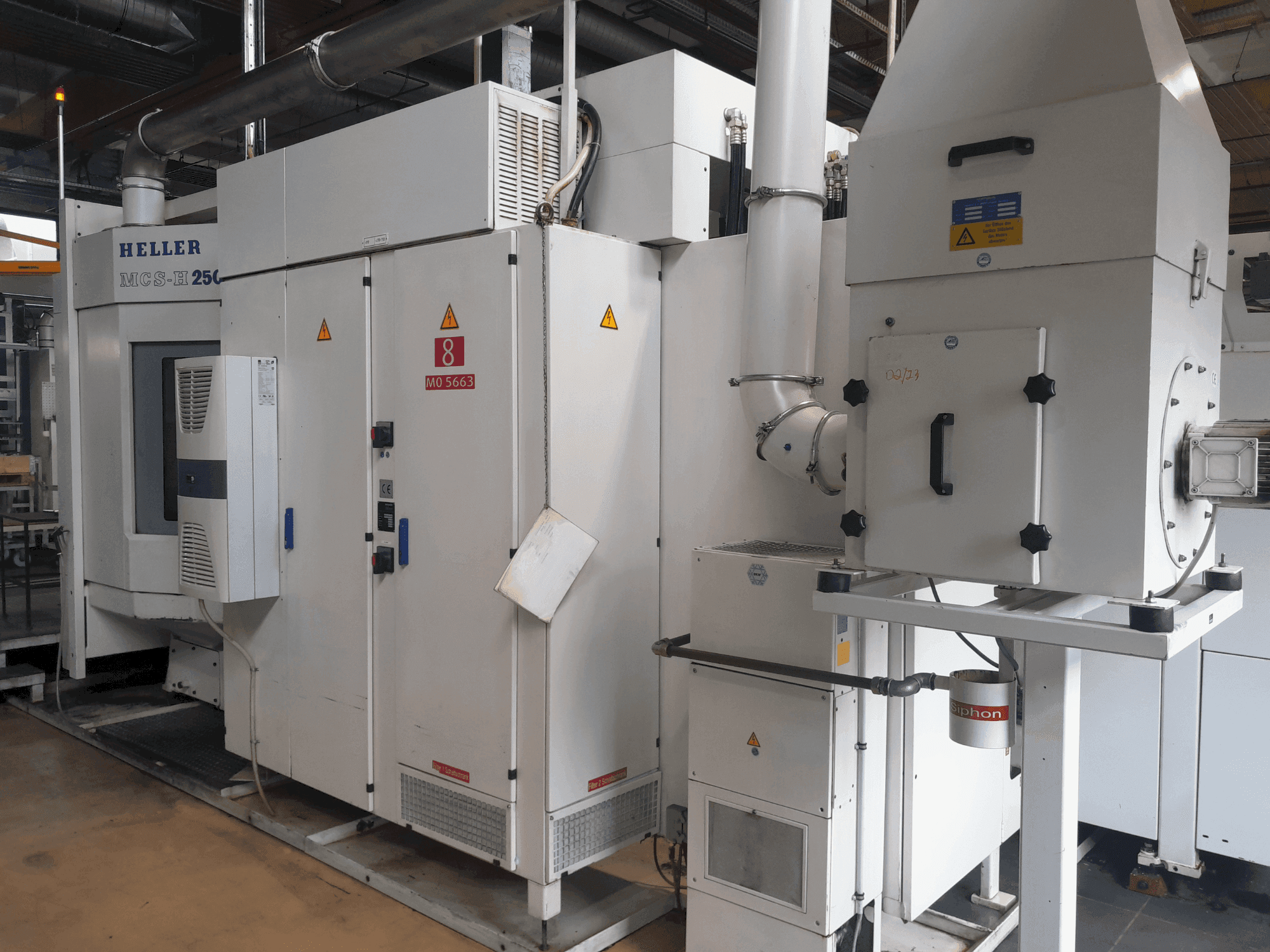 Front view of HELLER MCS-H 250 machine