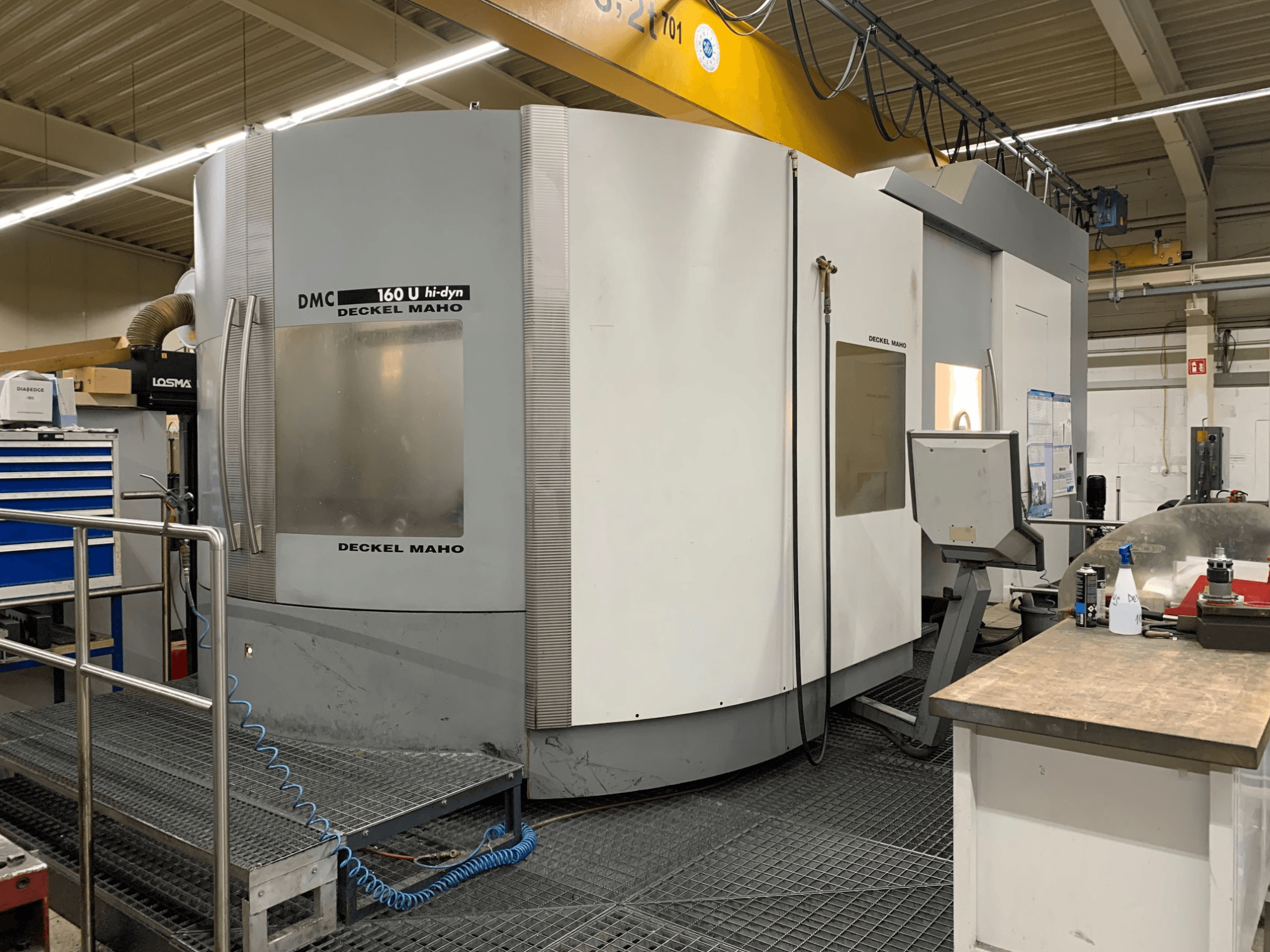 DECKEL MAHO DMC 160 U Hi-Dyn universal machining center, front view, showcasing control panel and oversized, circular design.
