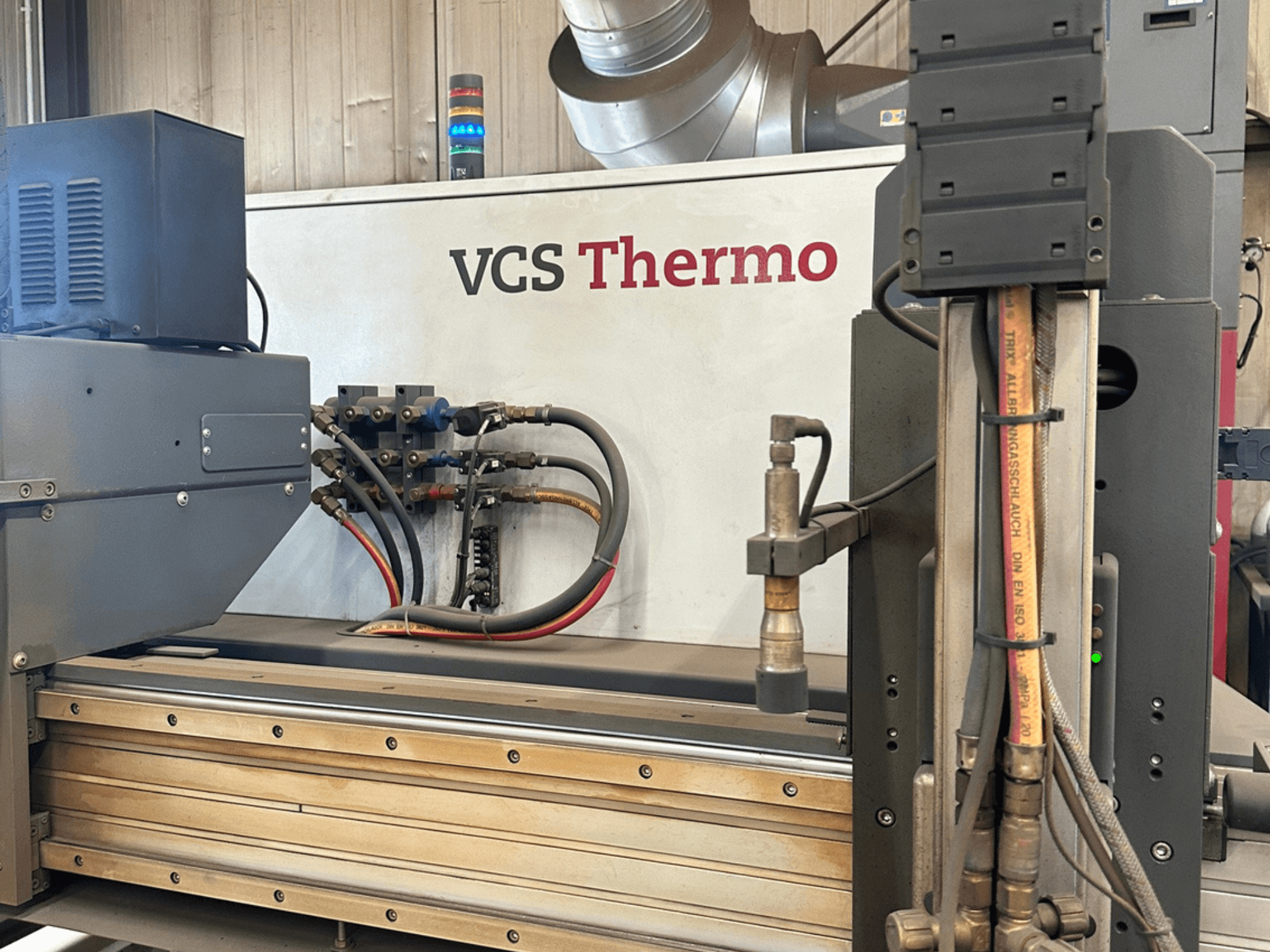 Hypertherm HPR130XD plasma cutting machine, side view showcasing connections, control panel, and operational components.
