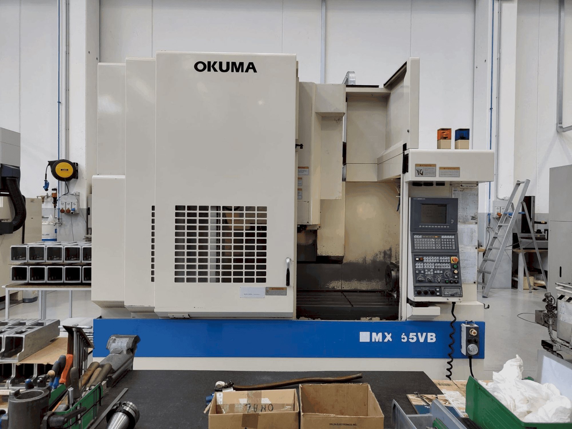 Front view of Okuma MX 55 VB machine