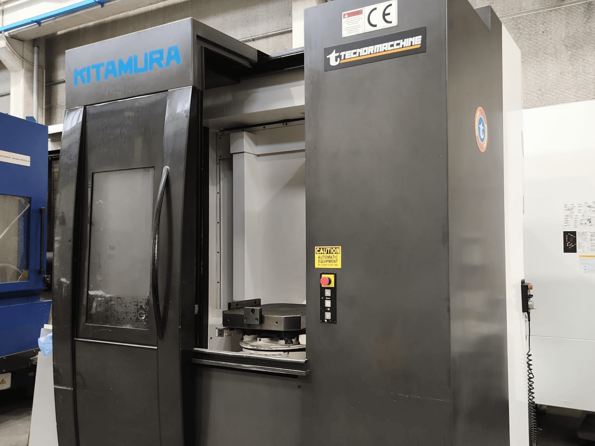 Horizontal machining centre Kitamura Mycenter HX500iG, front view showcasing control panel and working area.