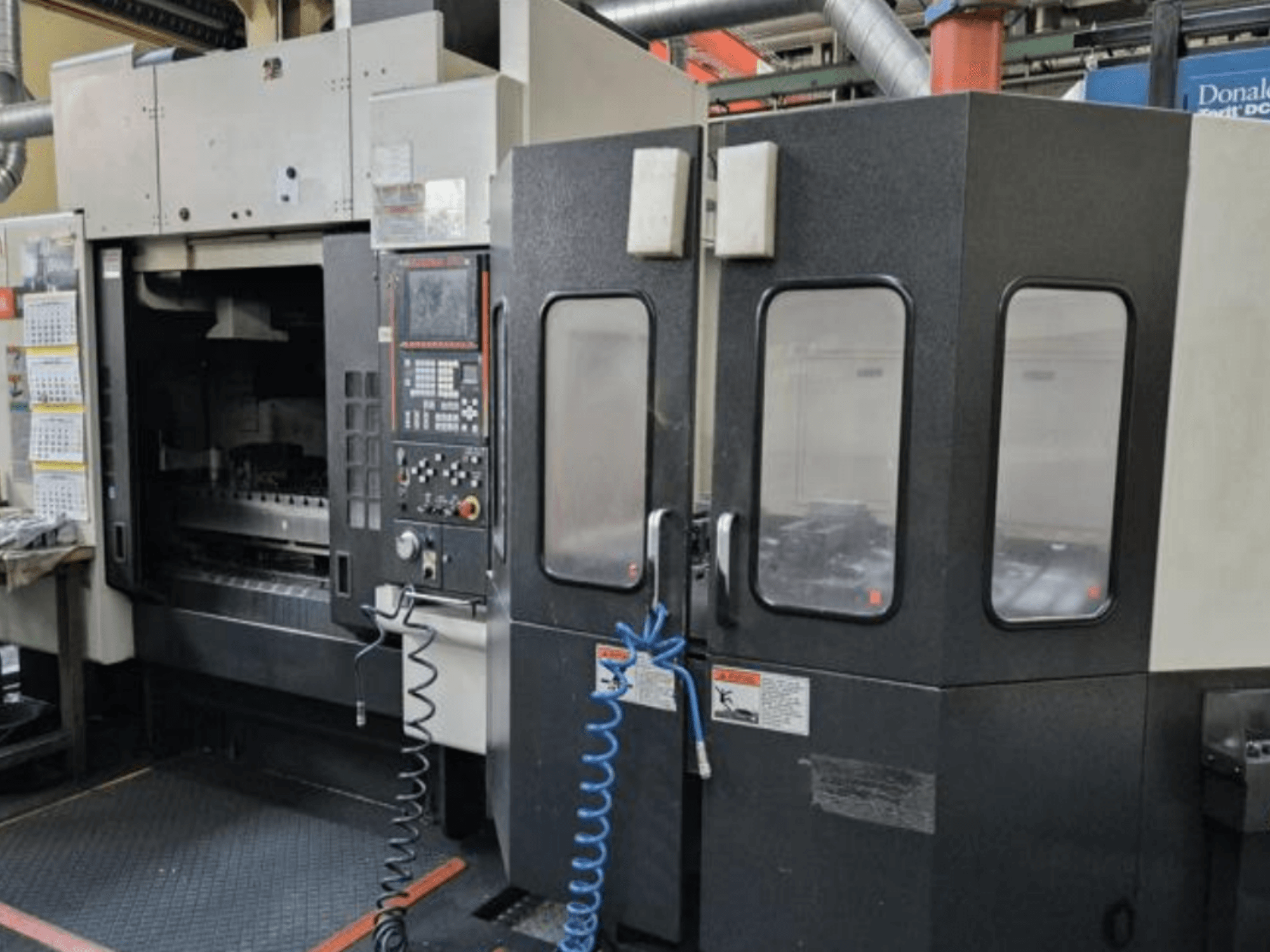 Mazak V515/40N Vertical Machining Centre in a front view, featuring control panel and enclosed work area.