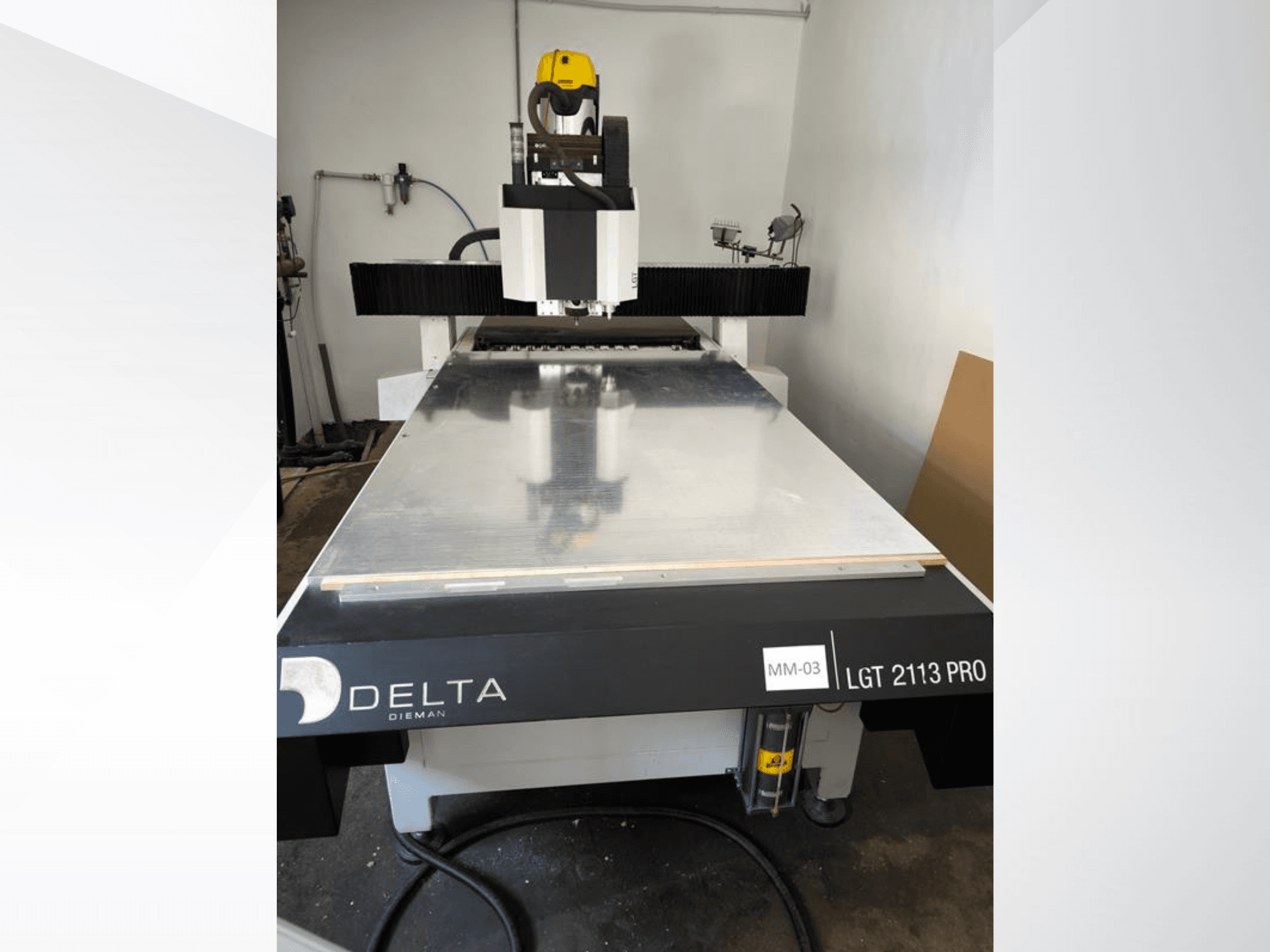 Delta LGT2113 PRO gantry milling machine, front view, showcasing aluminum surface and control panel details.