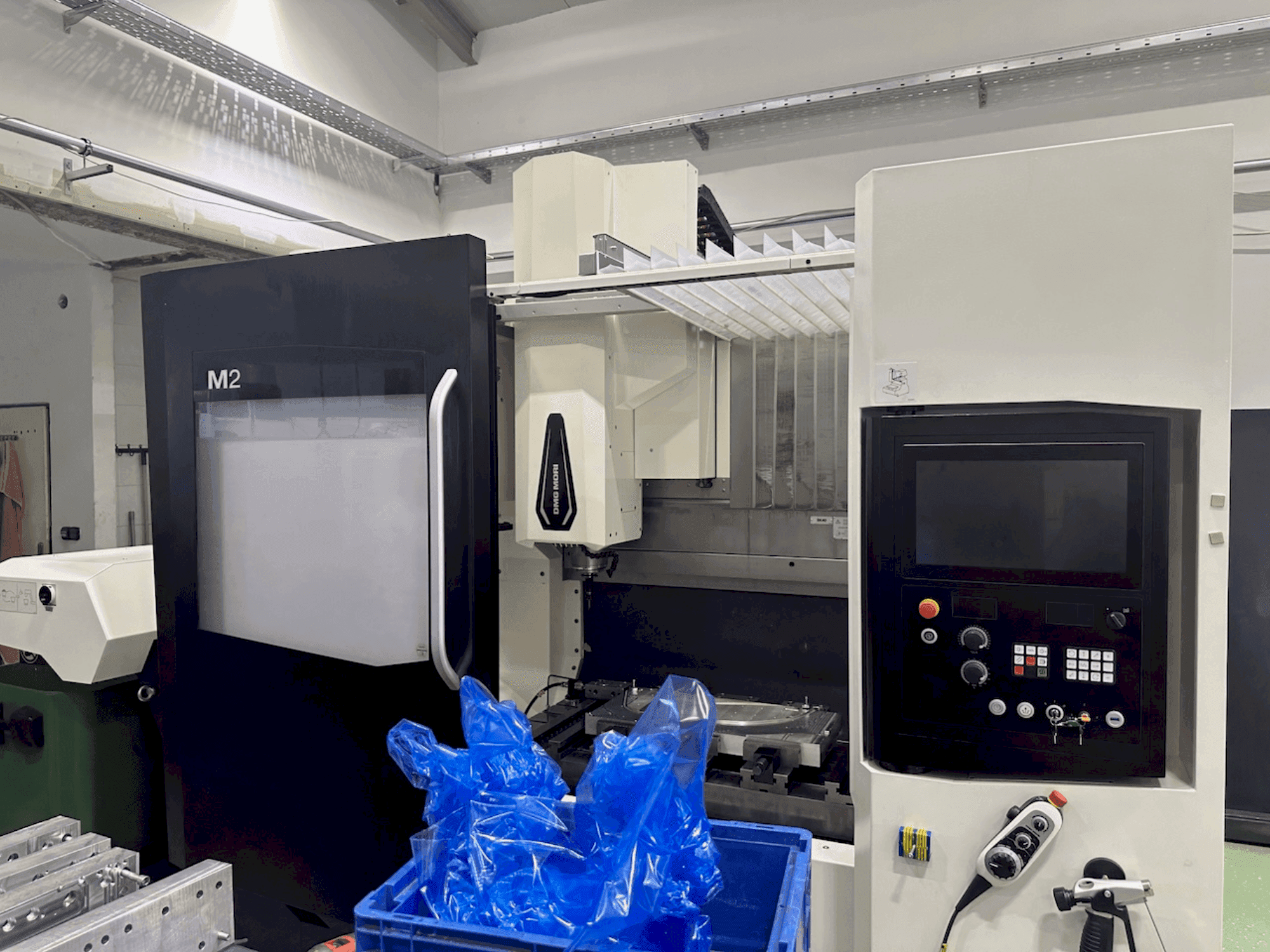Front view of DMG MORI M2 Pro machine