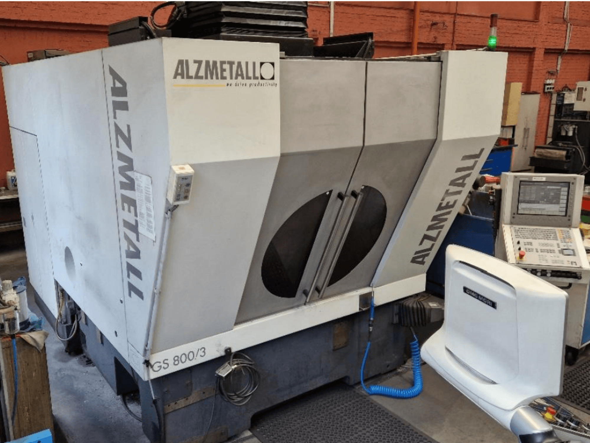 Alzmetall GS 800/3 vertical machining centre, front view showing the machine body and control panel.