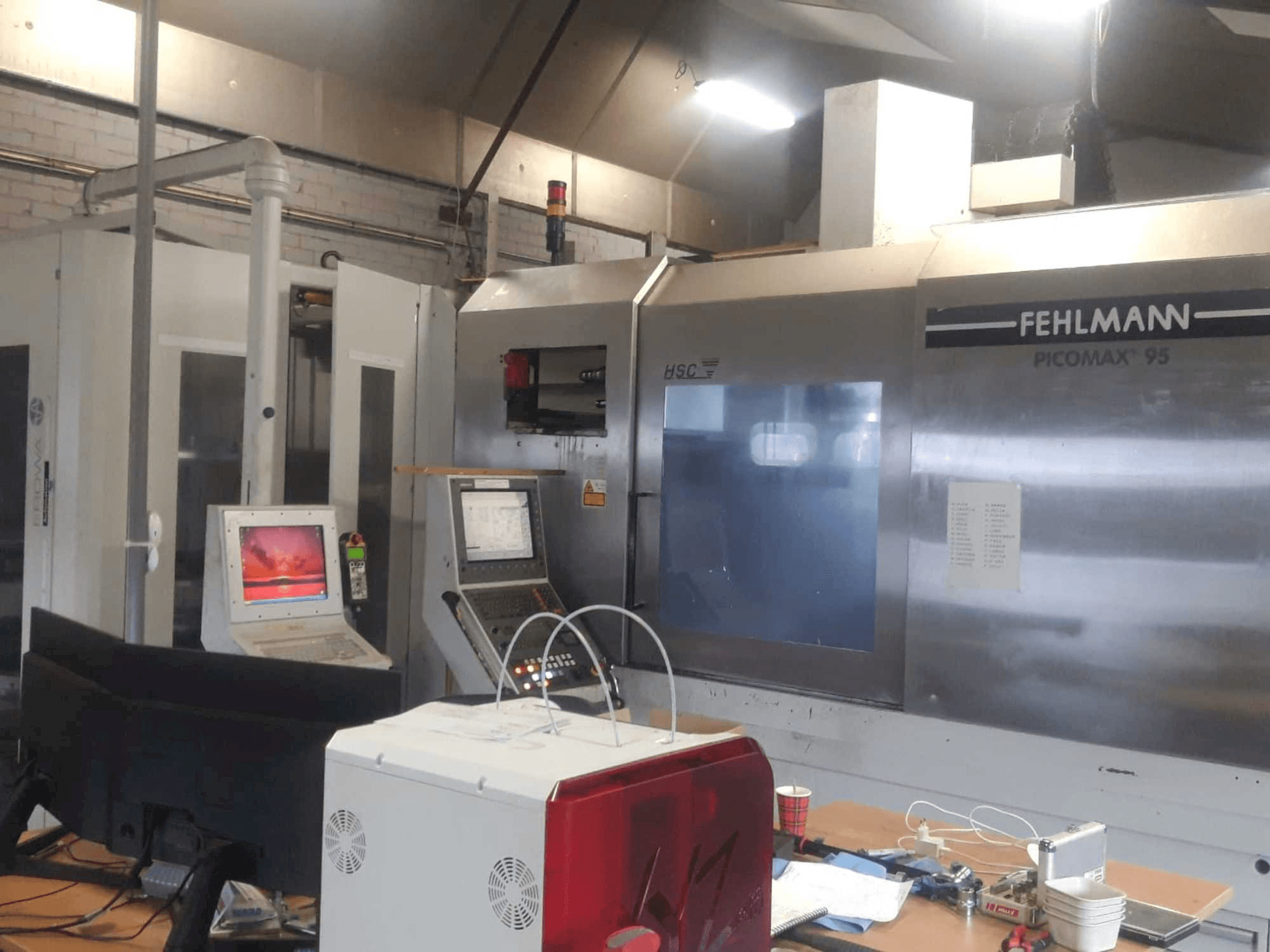 Front view of FEHLMANN PICOMAX 95 + EROWA machine
