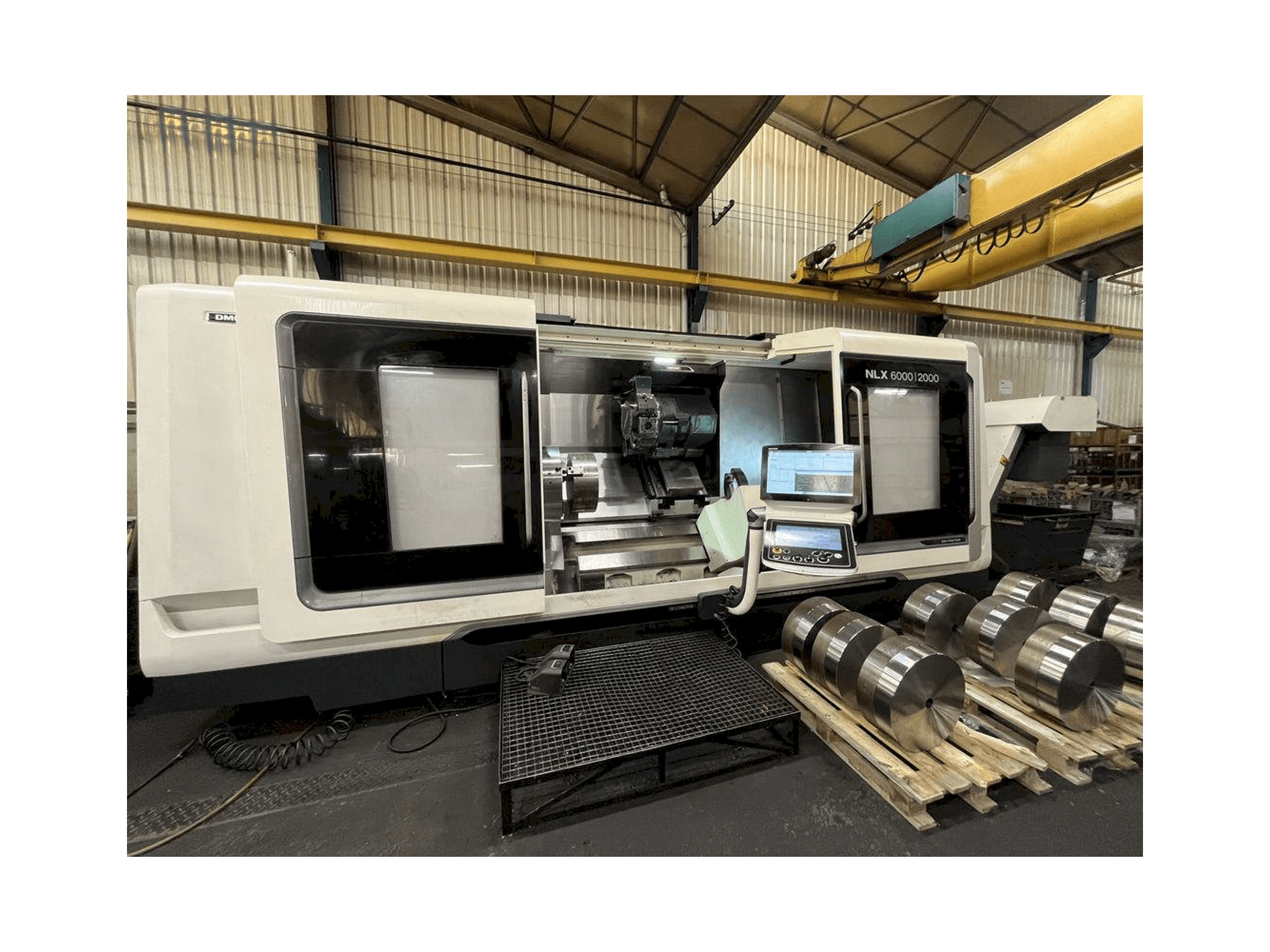 Left side view of DMG MORI NLX 6000 | 2000 machine