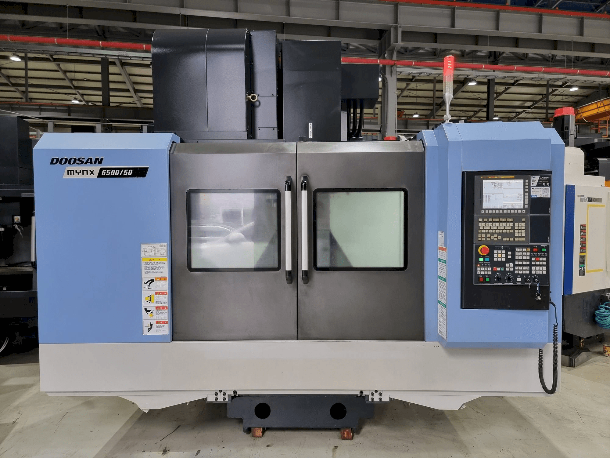 Front view of Doosan MYNX 6500/50 machine