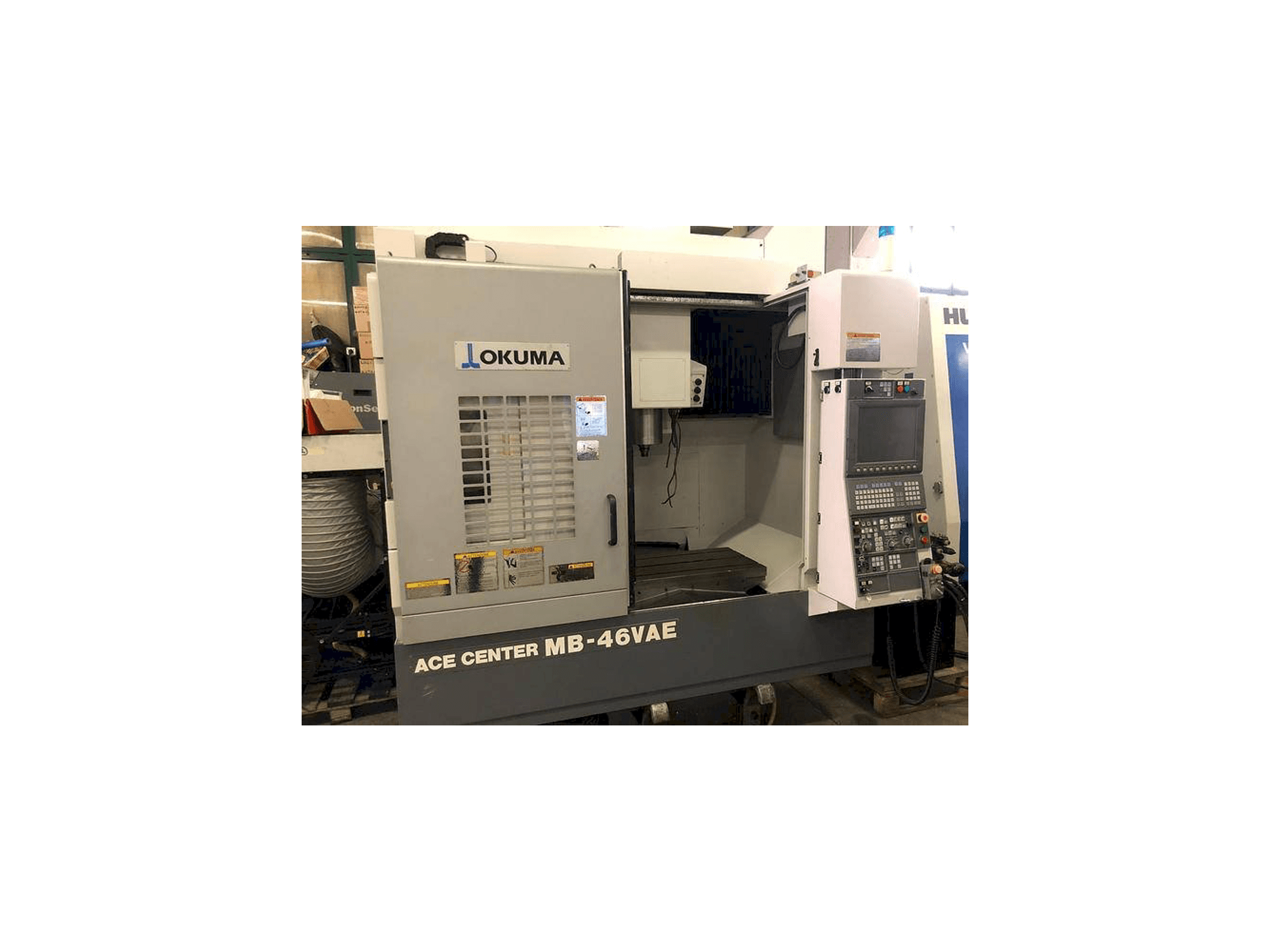 Front view of Okuma MB-46 VAE machine