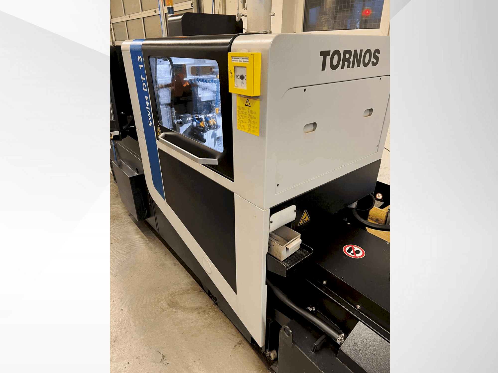 Front view of Tornos Swiss DT 13 machine