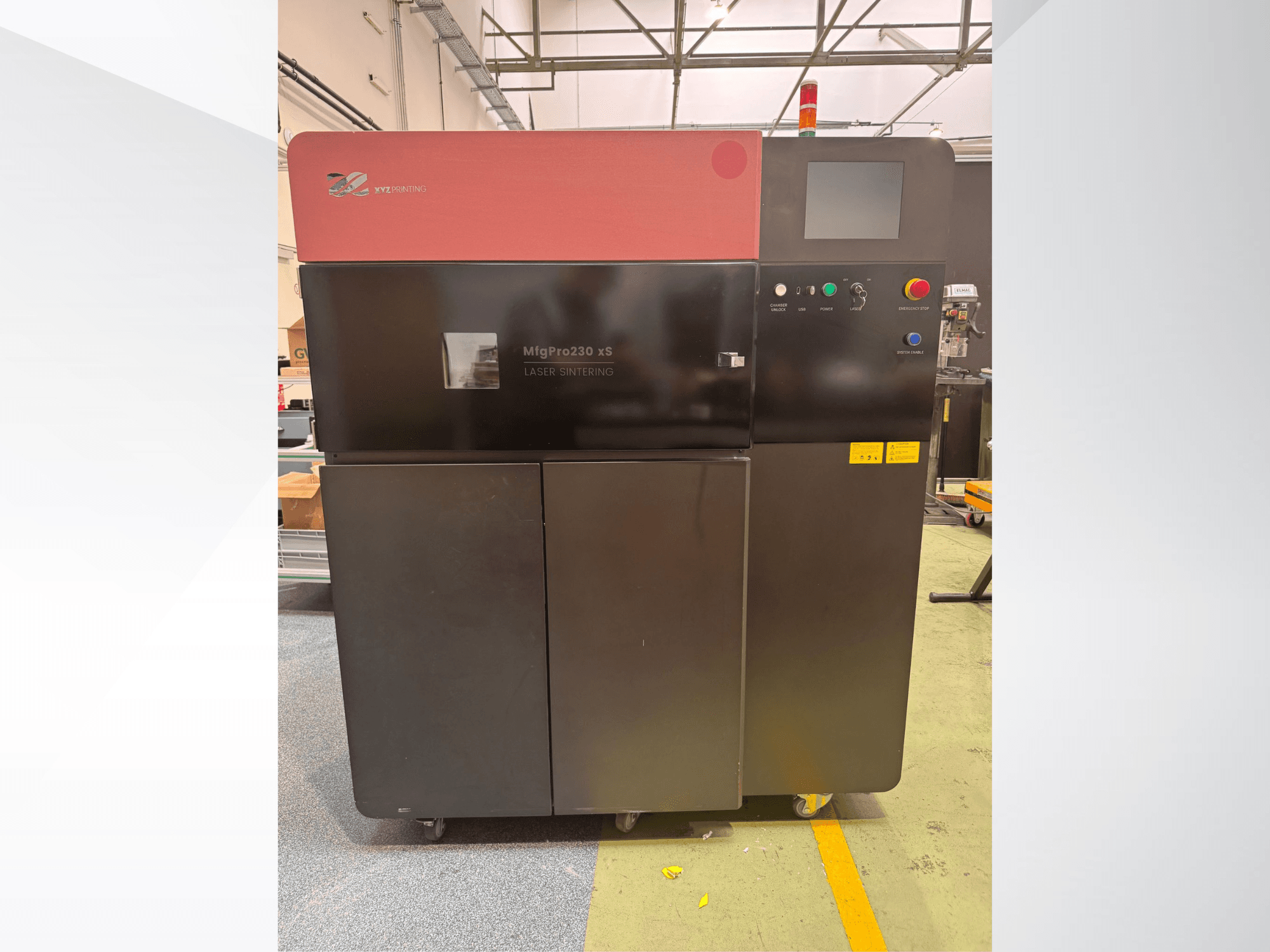 XYZprinting MfgPro230 xS plastic 3D printer in front view, featuring control panel and warning lights.
