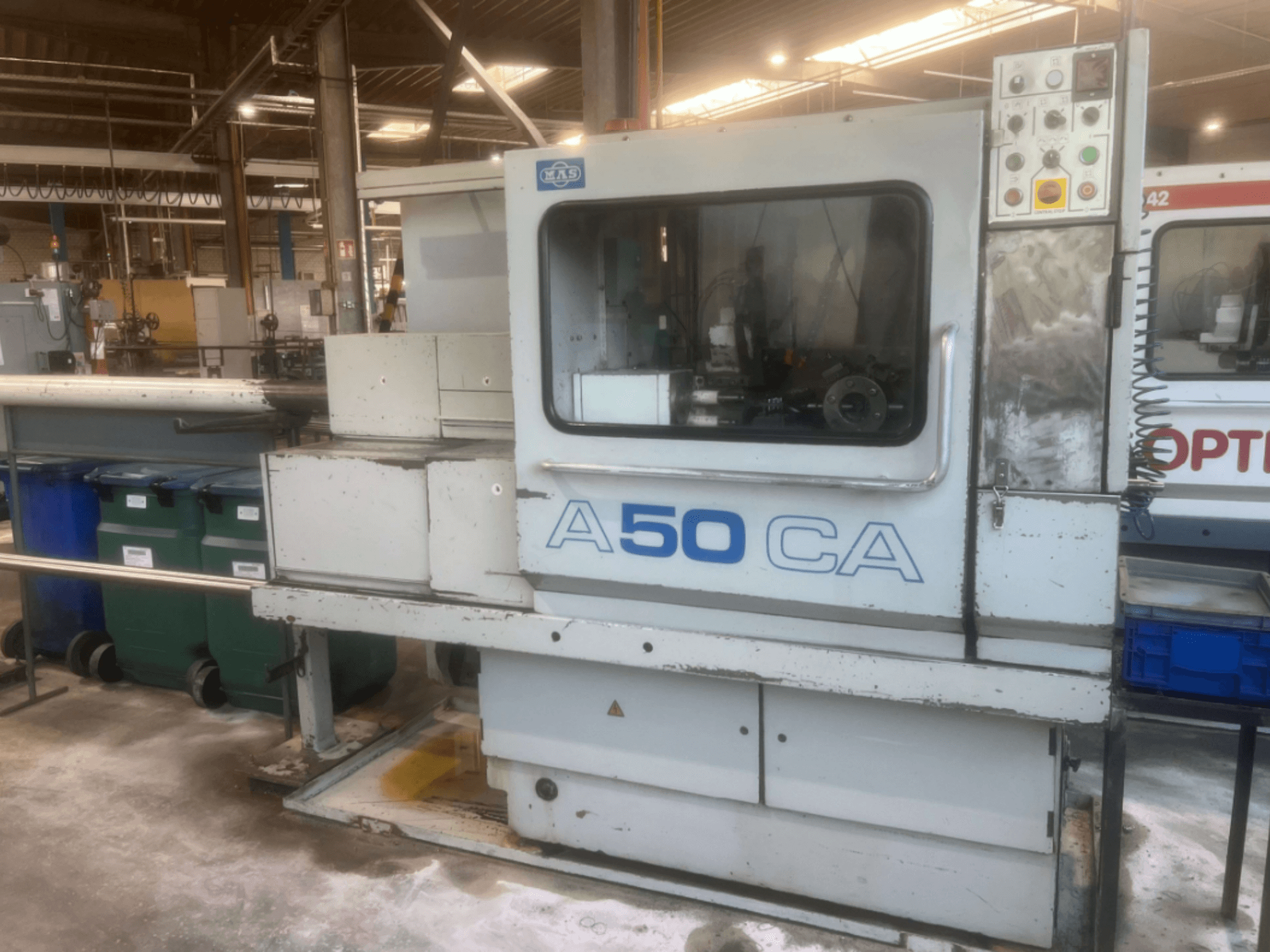 KOVOSVIT MAS OPTIMAT A50CA horizontal turning machine, front view, displaying control panel and operational area.