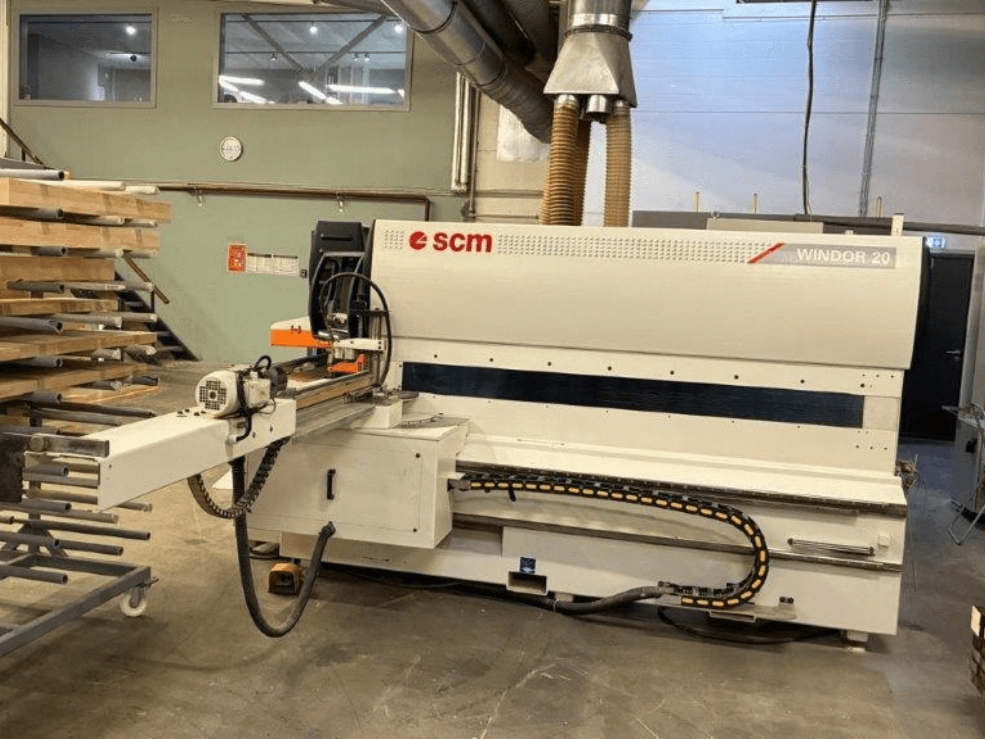 SCM Windor 20 wood processing machine in a workshop, viewed from the front, showcasing control panel and feeding mechanism.