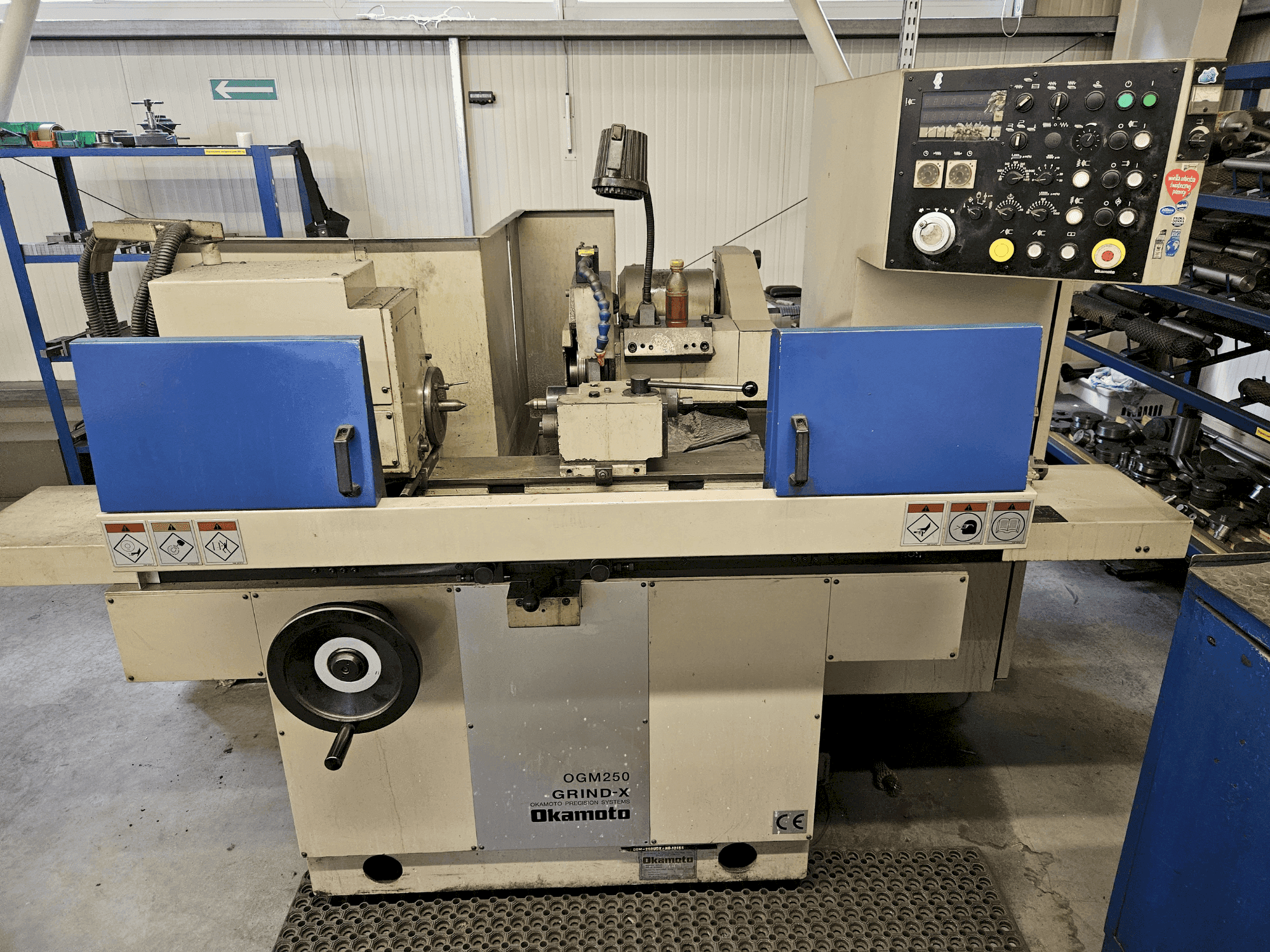 Front view of OKAMOTO OGM 250UDX GRIND-X machine