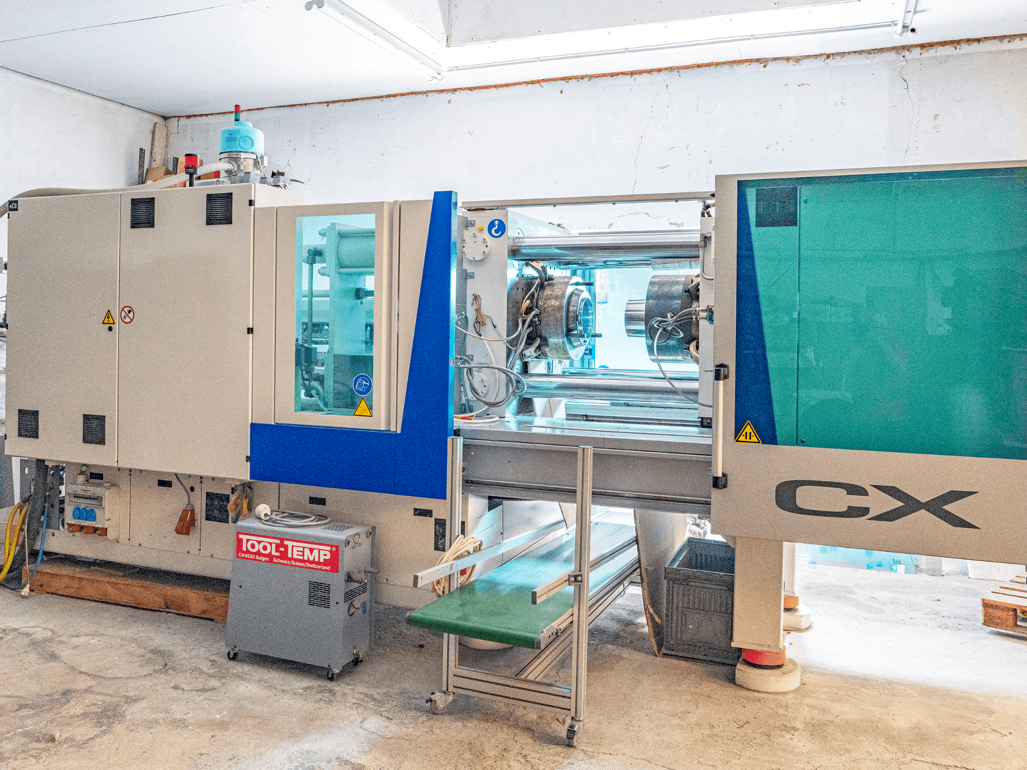 Front view of Krauss Maffei KM 200 CX 1400 MC5 machine