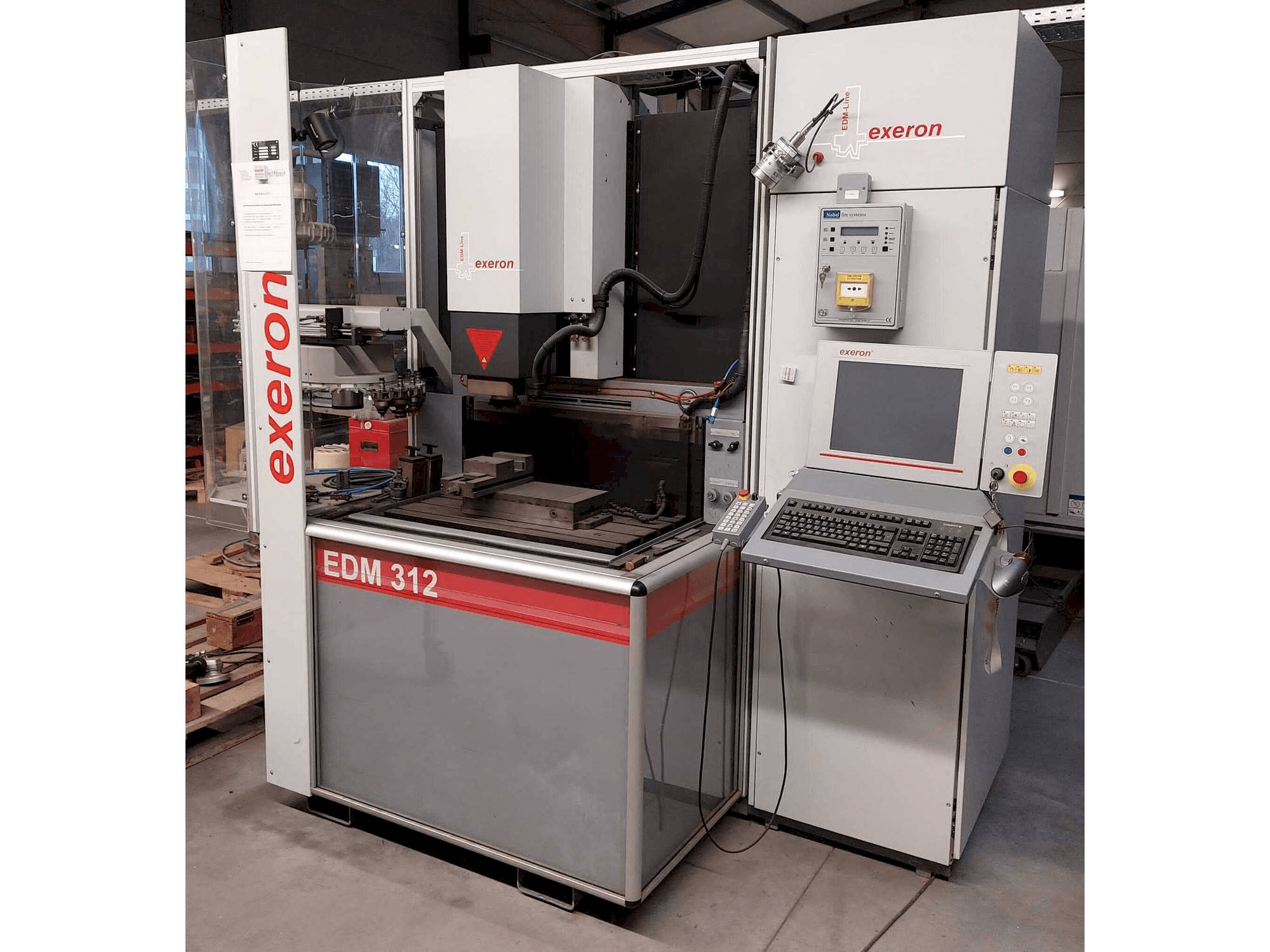 Front view of Exeron EDM 312 MF20 machine