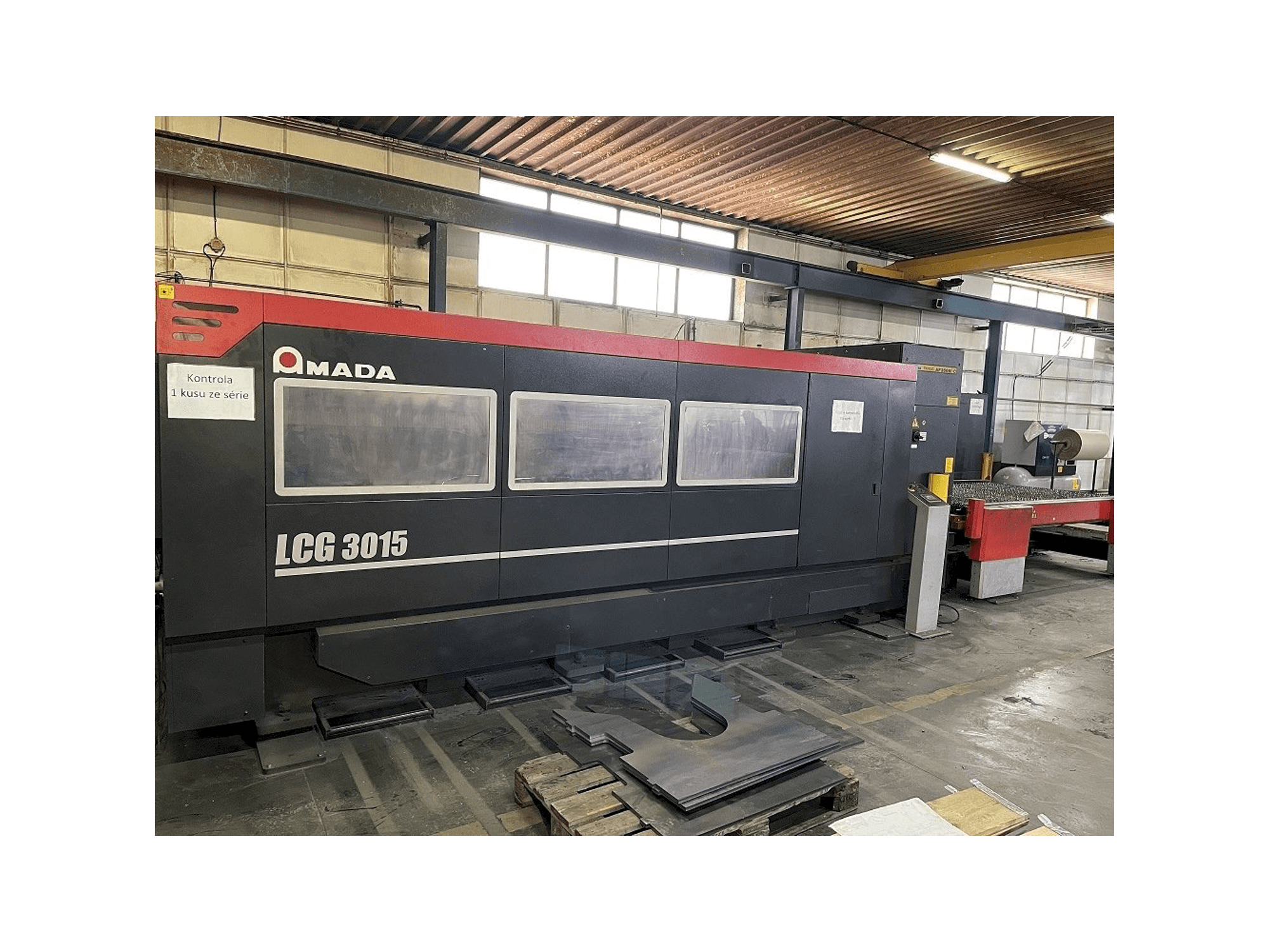 Front view of AMADA LCG 3015 machine