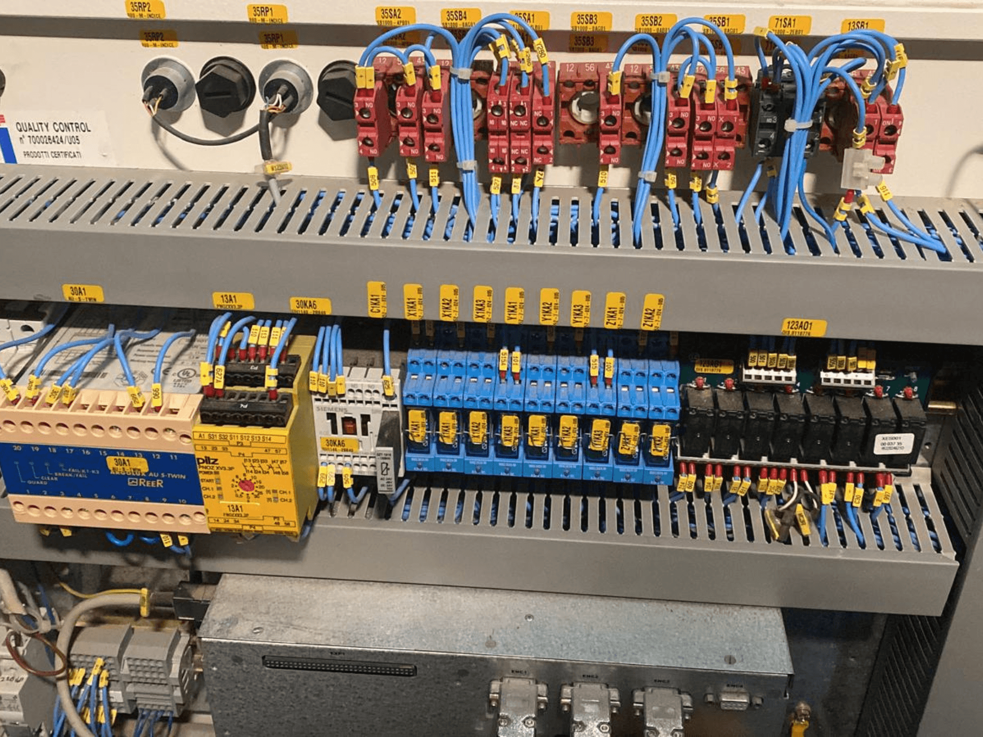 CNC Wood Machining Centre SCM PRATIX 48 NST control panel, featuring labeled wiring and various relays, front view.