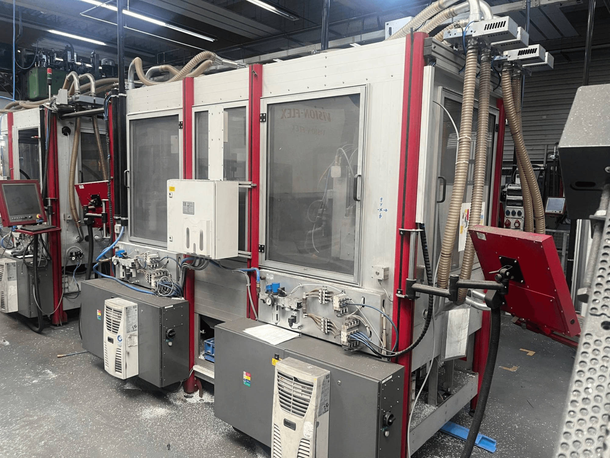 Gantry milling machine ISEL FlatCom M30 DoppelFlat 75-35, front view, showcasing control panel and connected hoses.