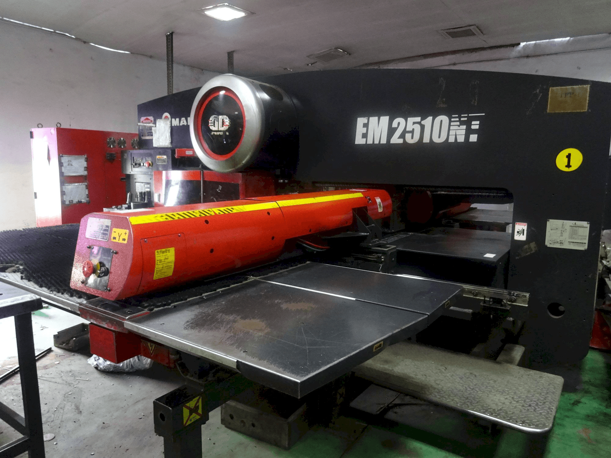 Front view of AMADA EM 2510 NT machine