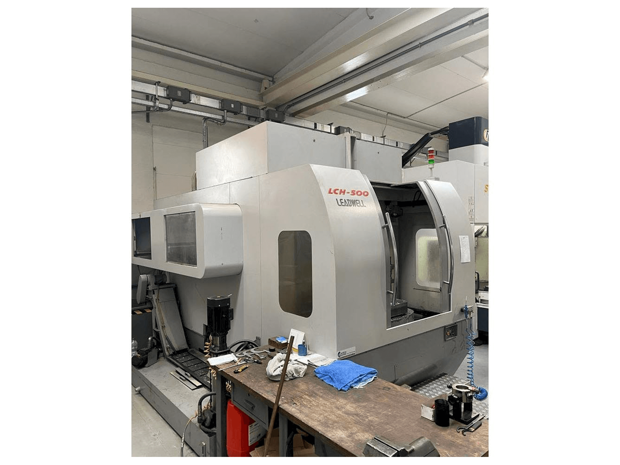 Left side view of Leadwell LCH-500 machine