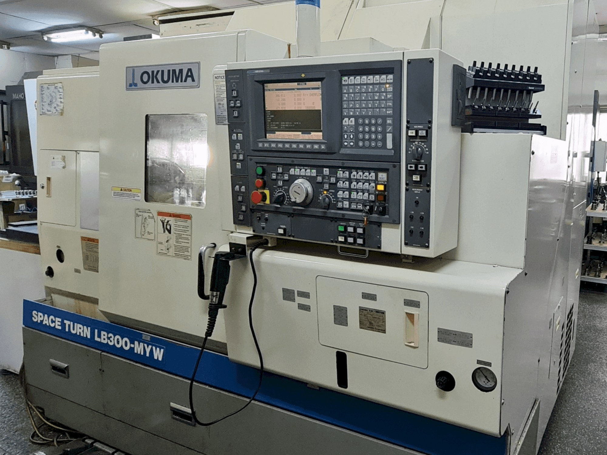 Front view of Okuma Space Turn LB 300 MYW machine