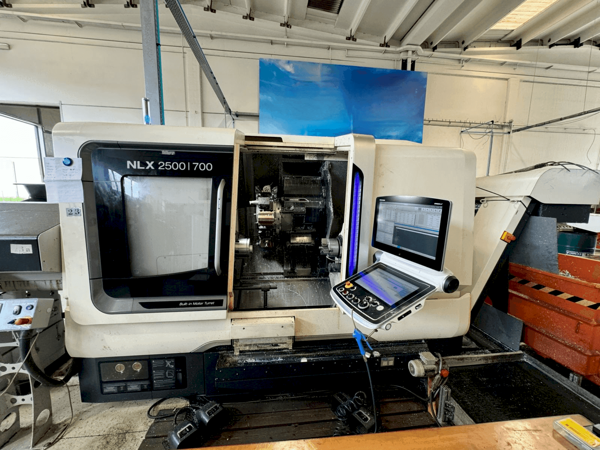 Front view of DMG MORI NLX2500SY/700 machine