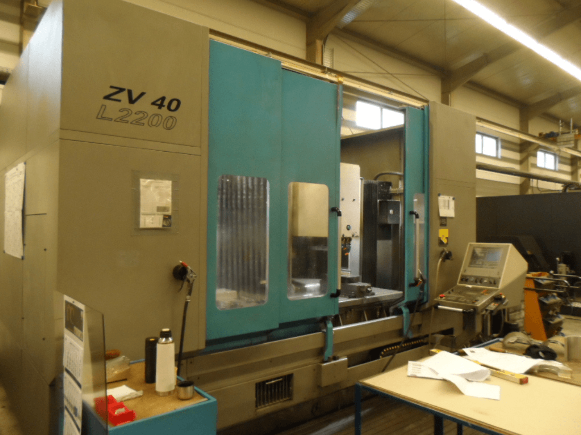 IBARMIA ZV 40 L2200 vertical machining center, front view with control panel and open access, visible tool holder inside.