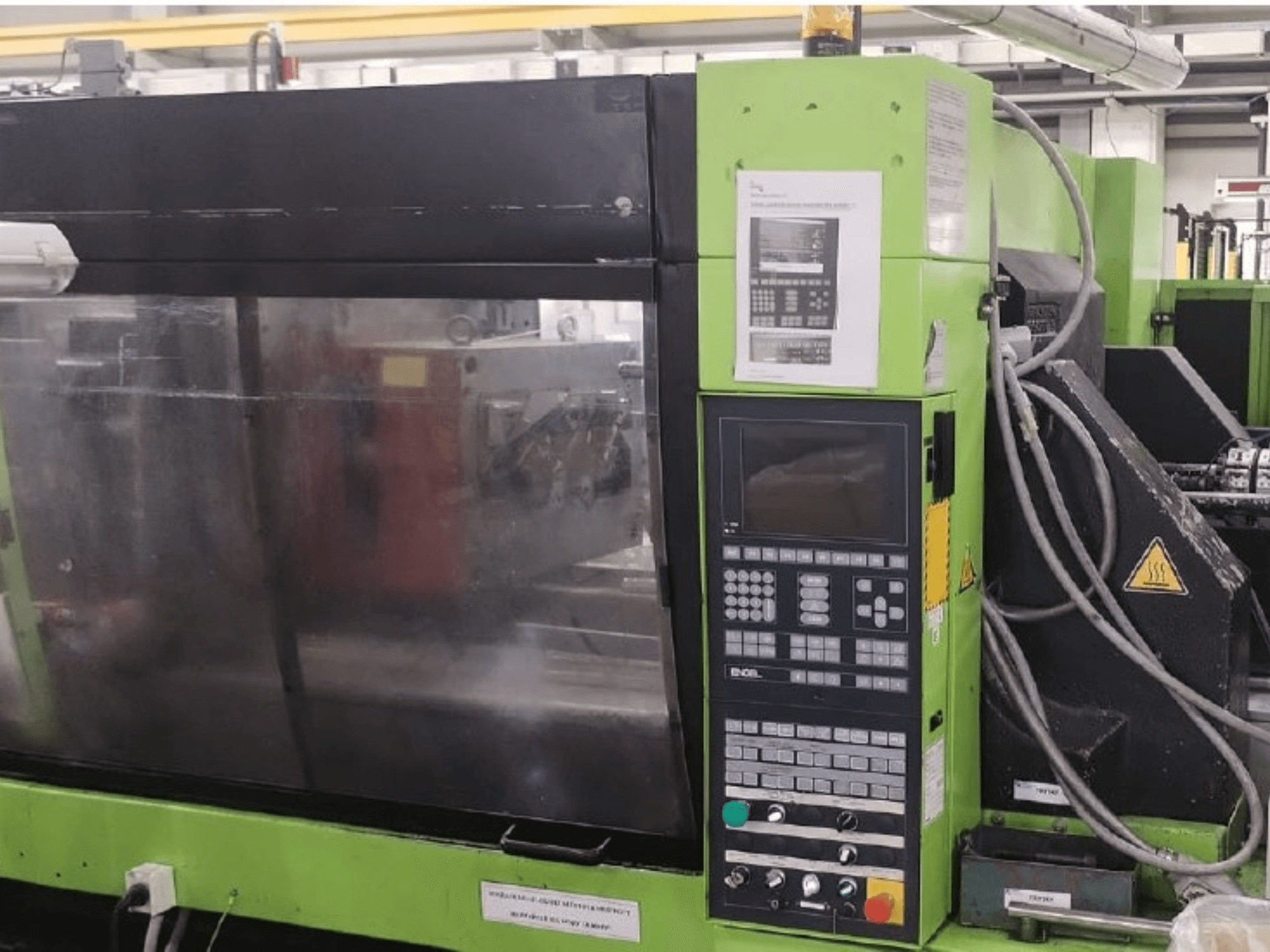 Engel ES 1050/275 HL-V hydraulic injection moulding machine, side view showing control panel and operational details.